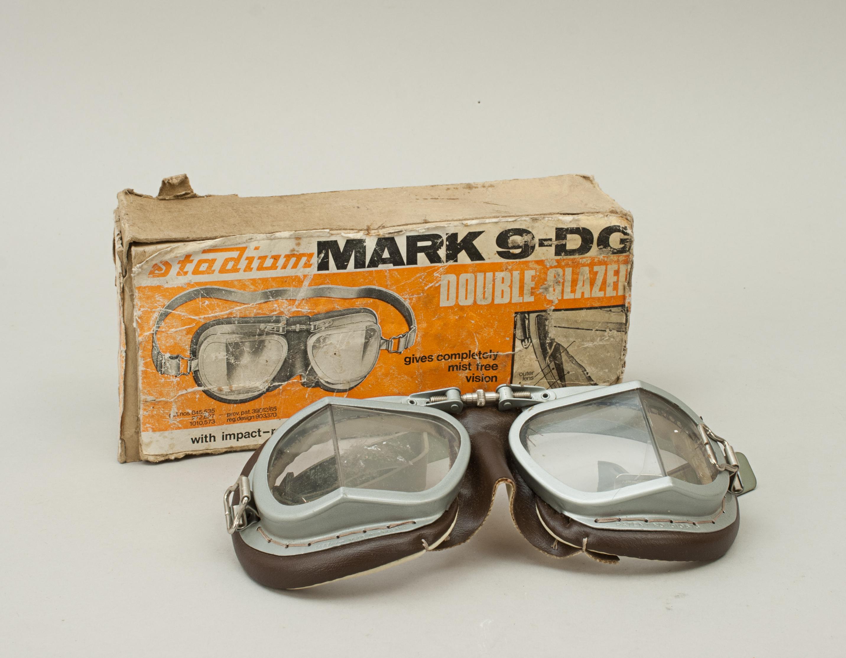 Double glazed 'Stadium' Mark 9-DG Goggles.
A good pair of Stadium Motoring or Motorcycle goggles in the original Stadium cardboard box. The goggles in good condition with padded soft synthetic leather facemask and adjustable brow-bridge. The silver