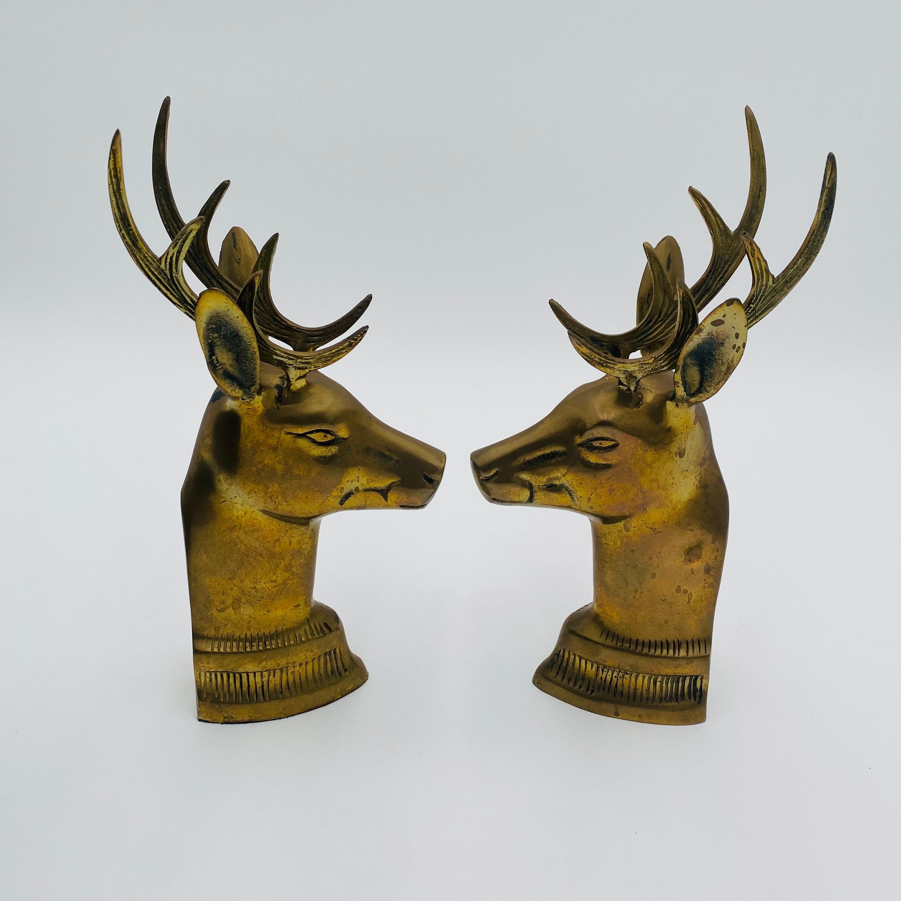 Elegant brass bookends in the form of two stag heads. They are heavy and will hold heavy books in space on your bookshelf. 
