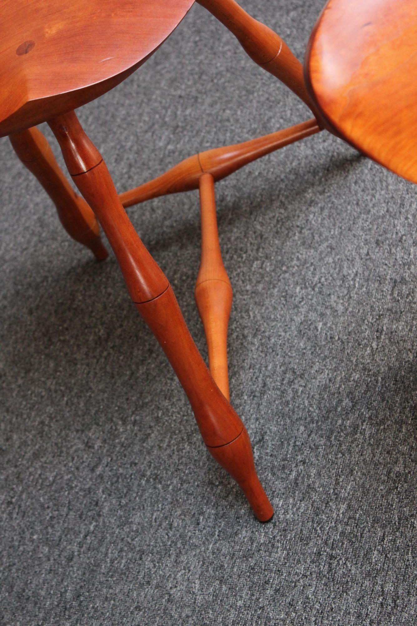 Pair of Vintage Studio Craft Windsor-Style Three Legged Low Stools in Cherrywood For Sale 3