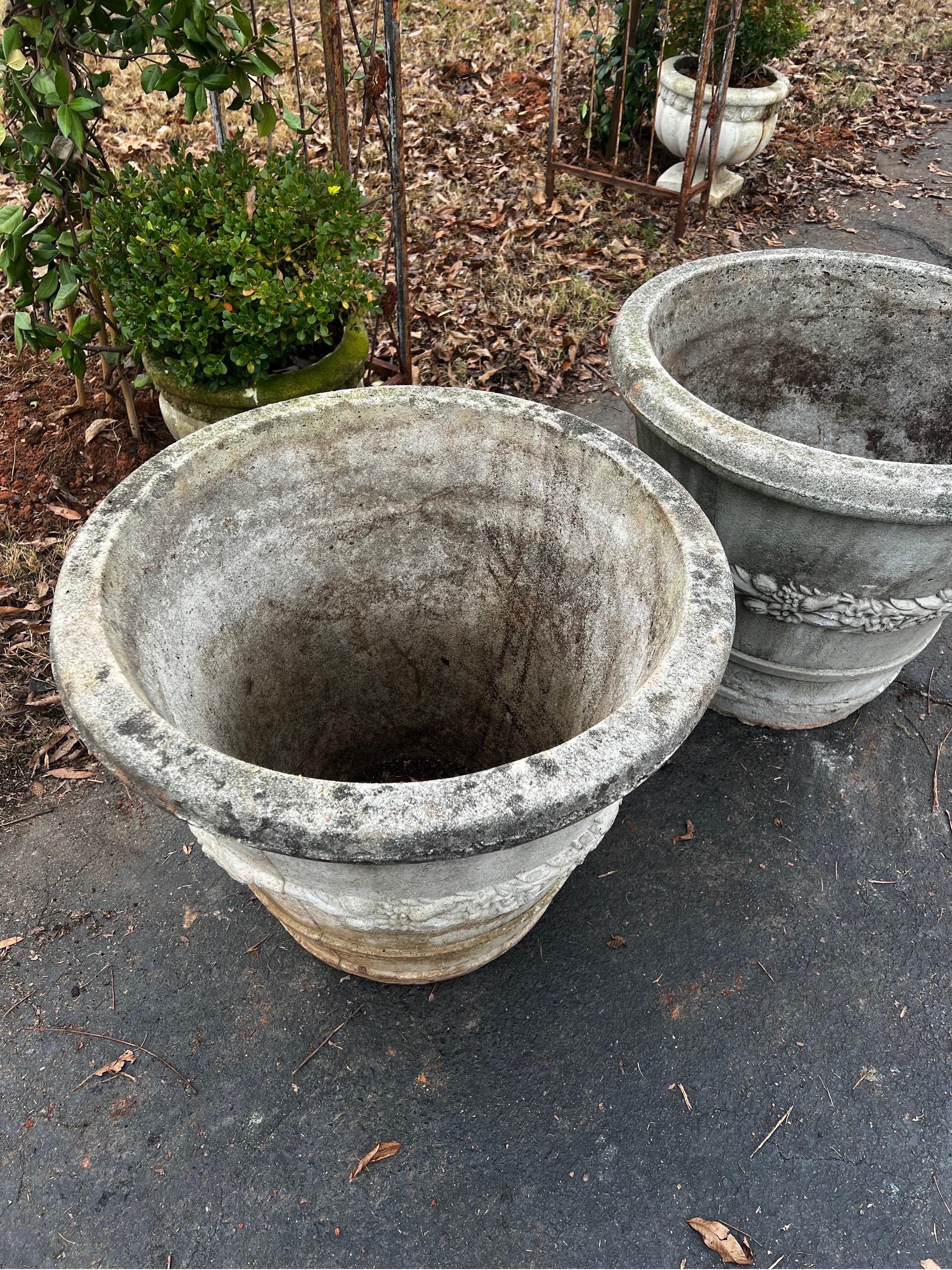 Pair of large natural stone vintage garden planters with swag design. 
In great overall shape showing signs of age/patina. 

