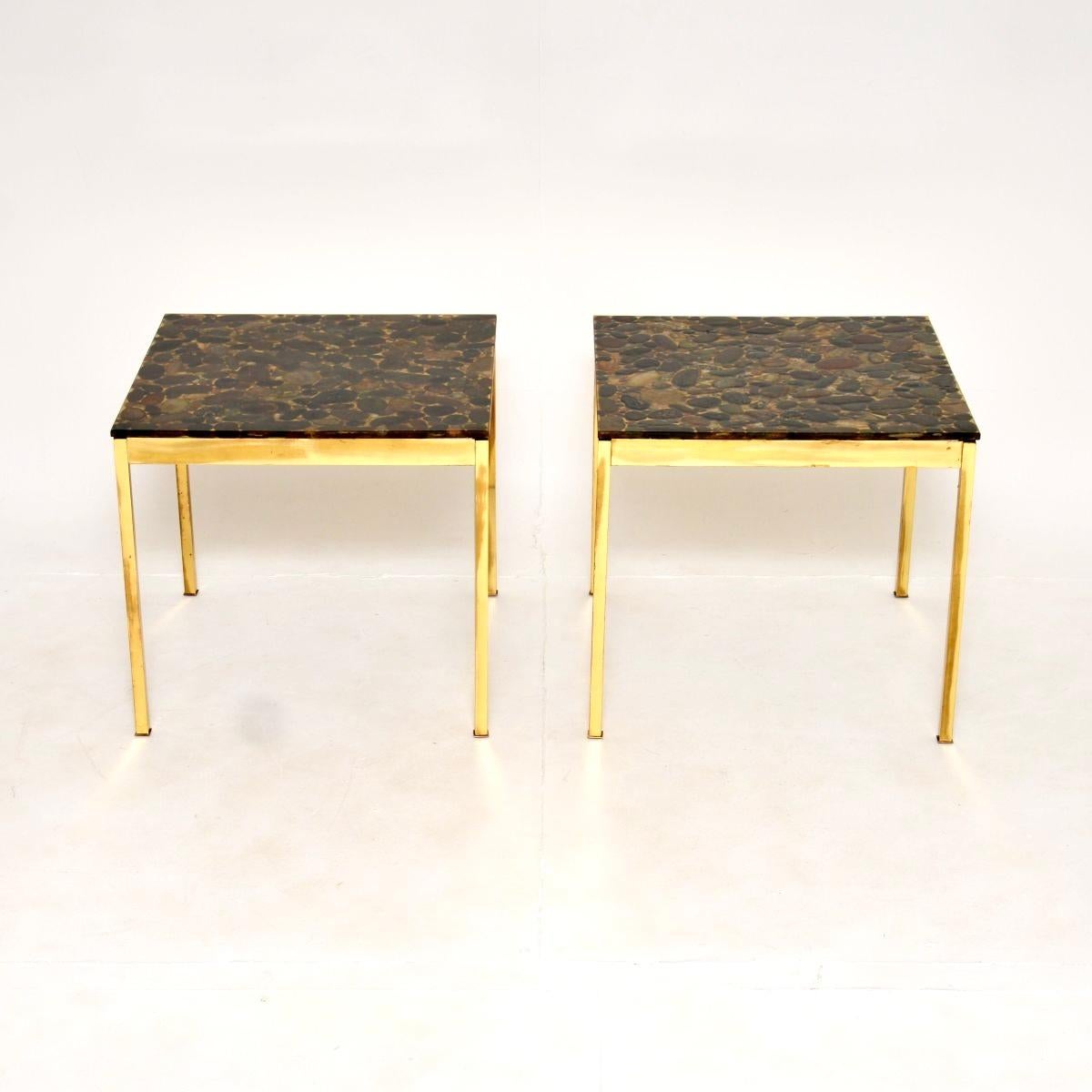 A wonderful pair of vintage Swedish brass and stone side tables. They were recently imported from Sweden, they date from the 1970’s.

The quality is lovely, the brass frames are nicely crafted and have amazing tops which are resin embedded with a