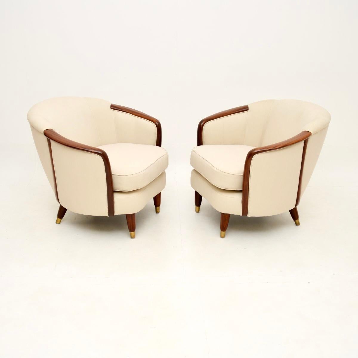 A stunning pair of vintage Swedish club armchairs. They were recently imported from Sweden, they date from around the 1950’s.

The quality is outstanding, they have wonderful curves, are are generous and very comfortable. They stand on beautifully