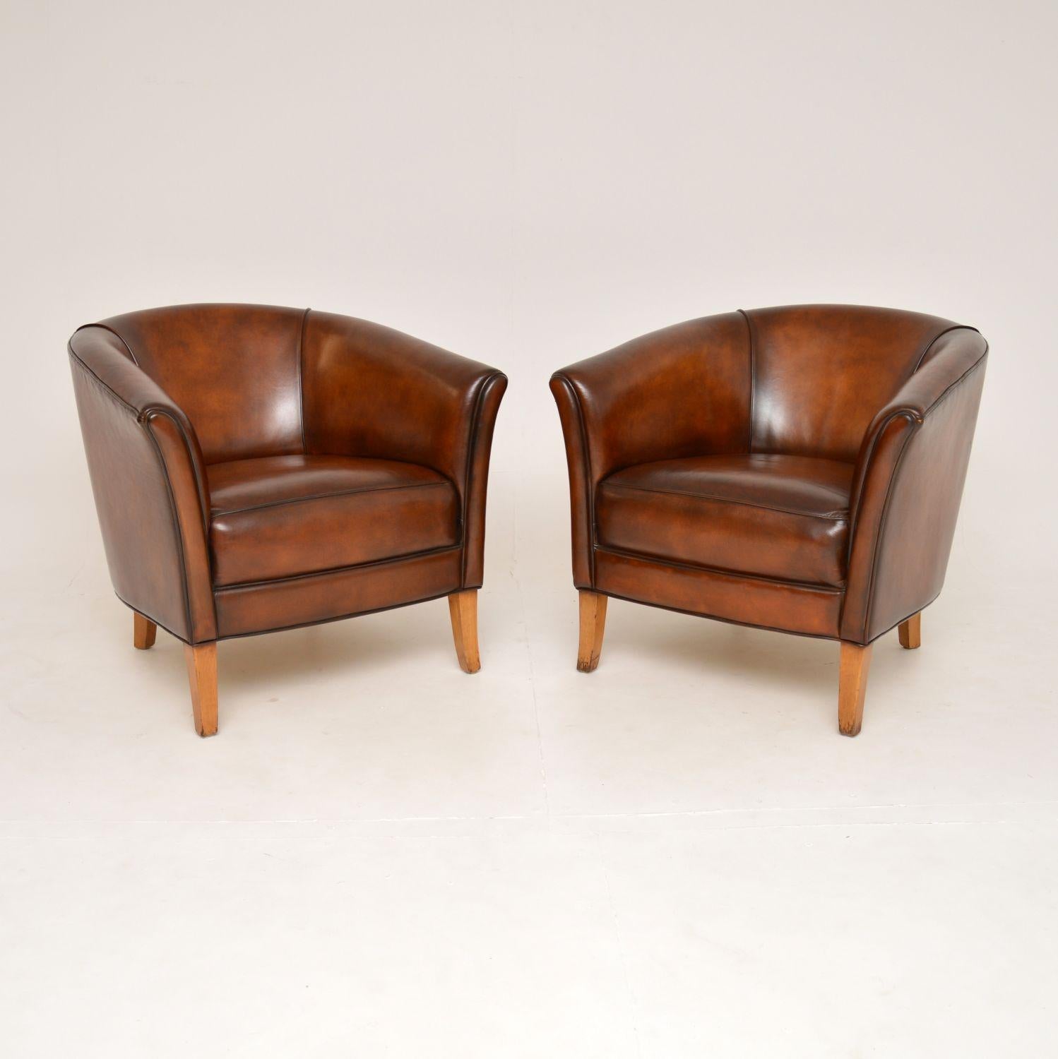 A superb pair of vintage leather club armchairs, they were recently imported from Sweden and date from around the 1960’s.

The quality is superb, they are very generous in proportion and extremely comfortable.

We have had the leather