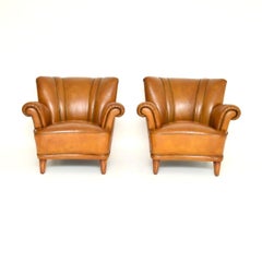 Pareja de sillones Club de cuero sueco vintage