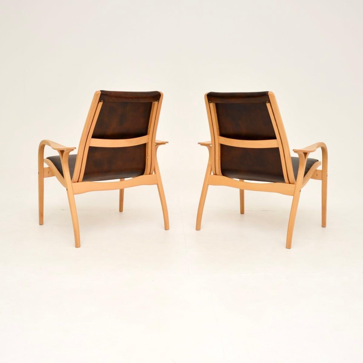 Suédois Paire de fauteuils Lamino suédois vintage en cuir par Yngve Ekstrom en vente