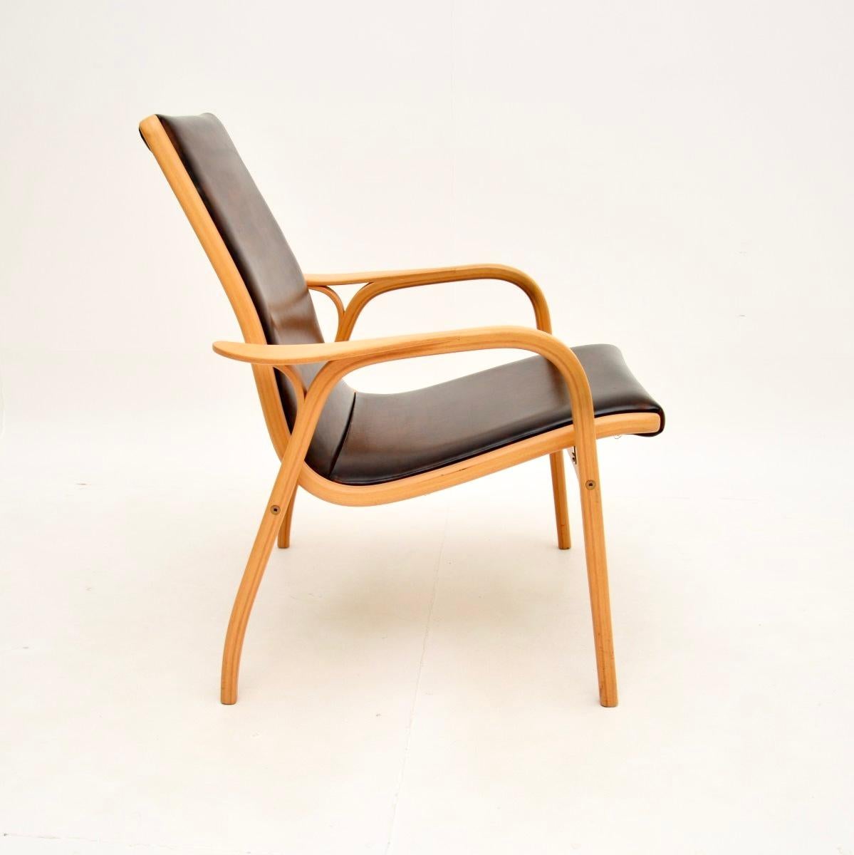 Paire de fauteuils Lamino suédois vintage en cuir par Yngve Ekstrom Bon état - En vente à London, GB