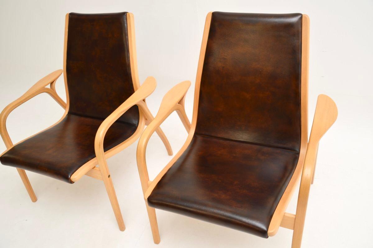 Cuir Paire de fauteuils Lamino suédois vintage en cuir par Yngve Ekstrom en vente