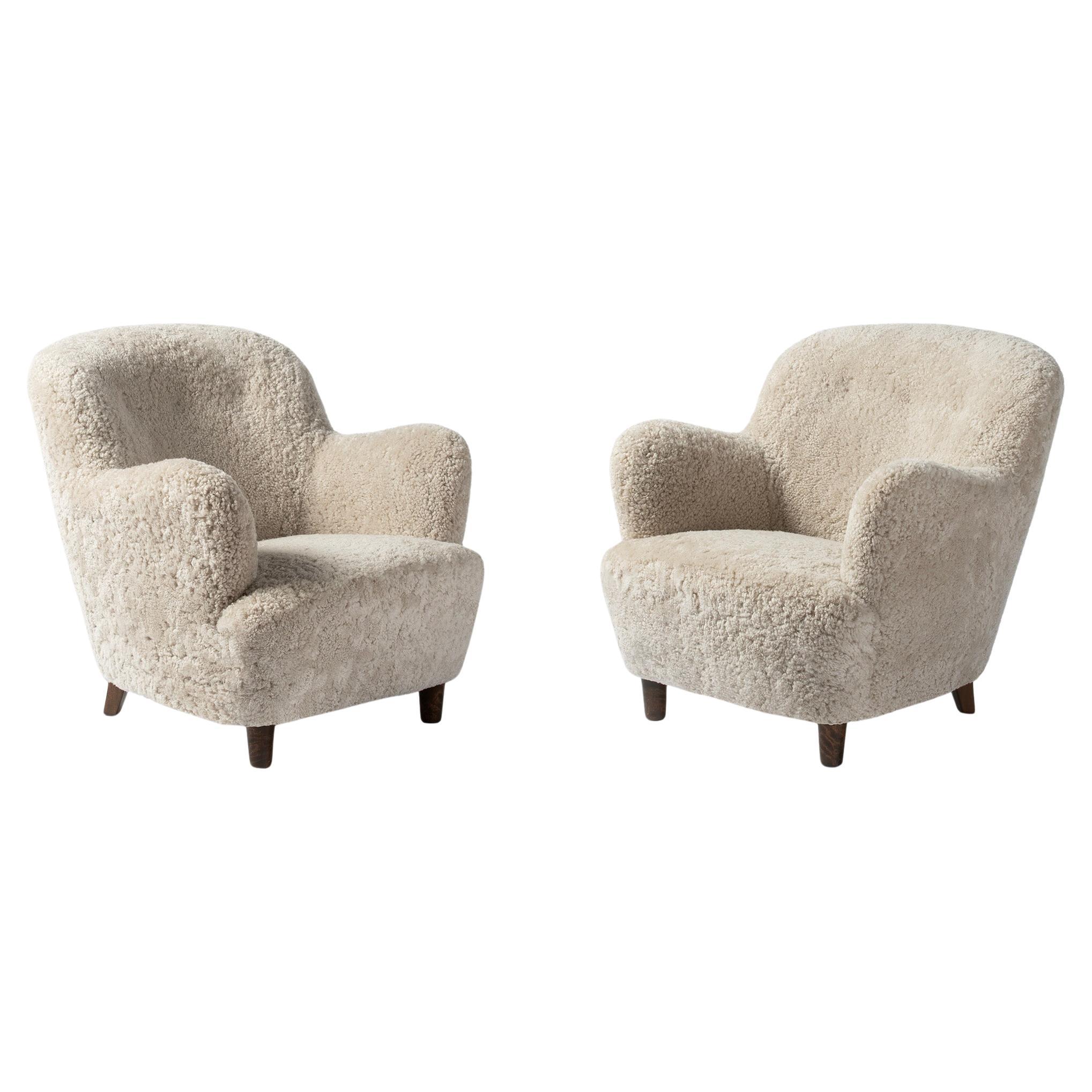Ein Paar schwedische Otto Schultz Lounge Chairs aus den 1940er Jahren