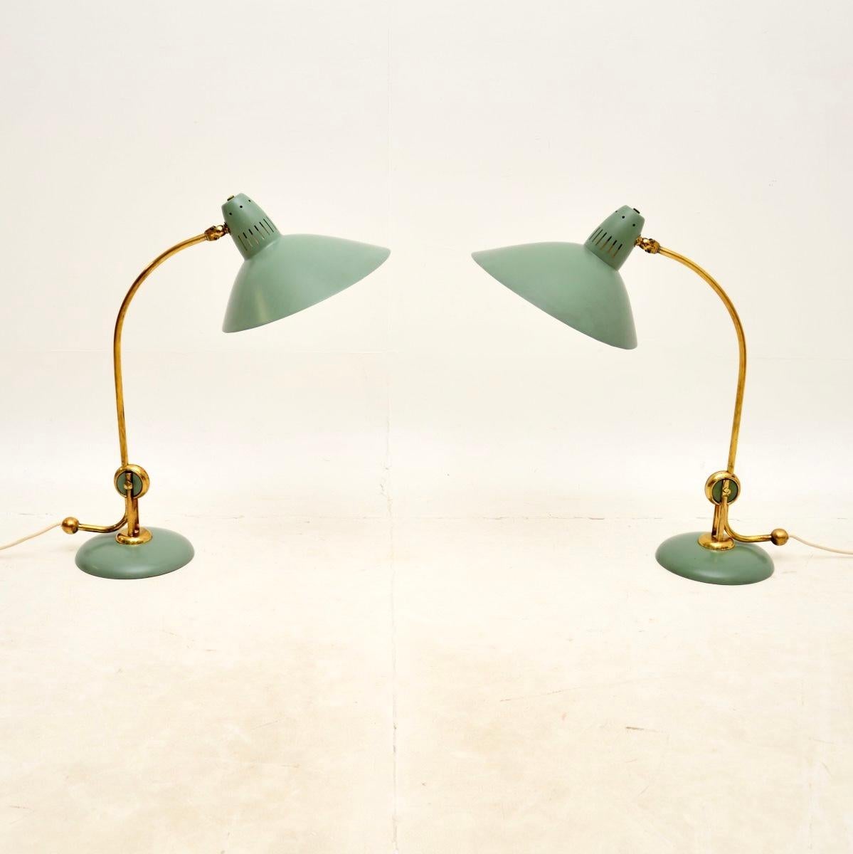 A stunning pair of vintage table lamps by Hala Zeist, made in Germany and dating from the 1950’s.

The quality is superb and they have an incredibly stylish design. They are made from brass and mint green metal, the shades have a fabulous flying