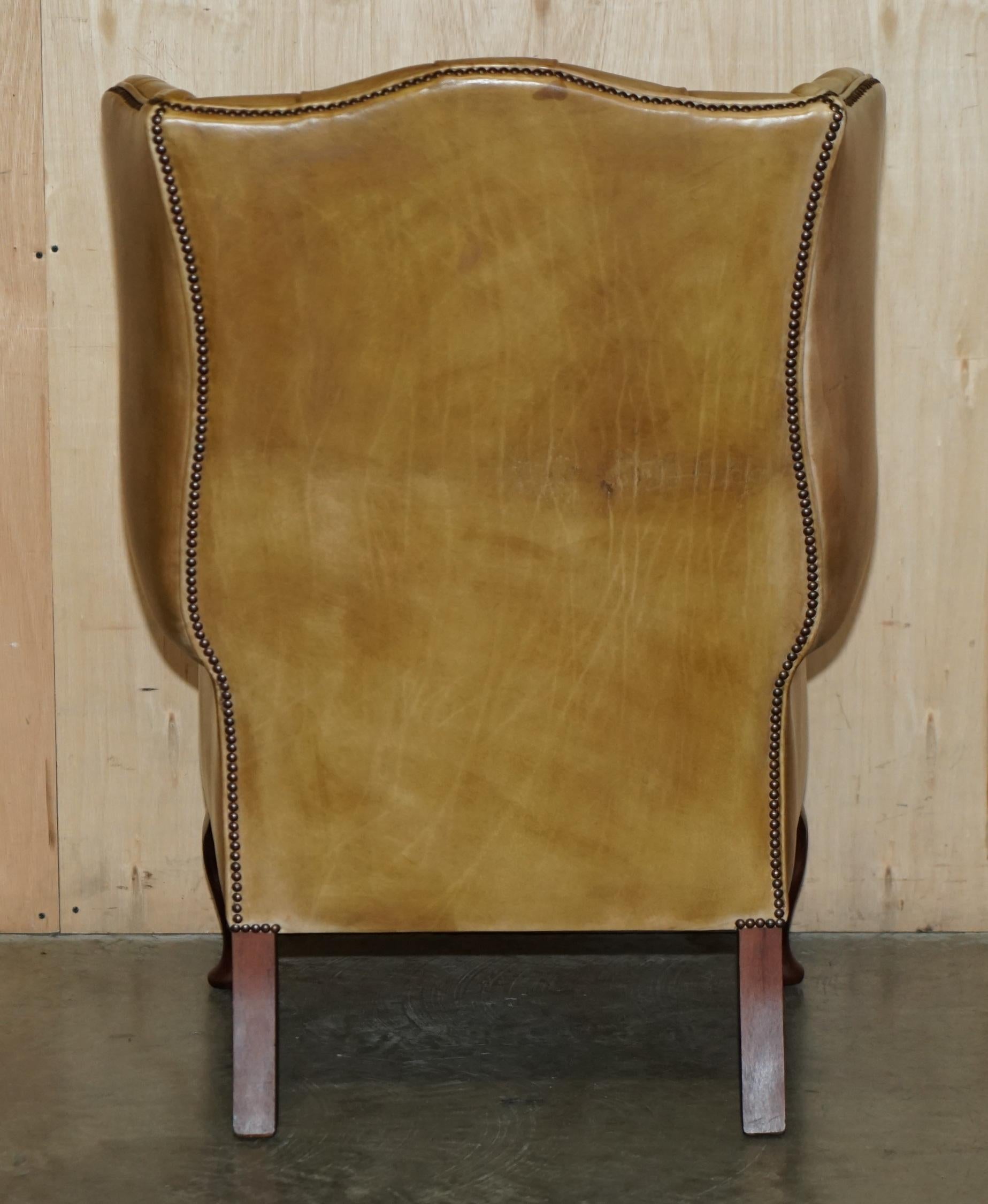 Paire de chaises à bandoulière vintage en cuir marron foncé avec pieds en fourrure en vente 2
