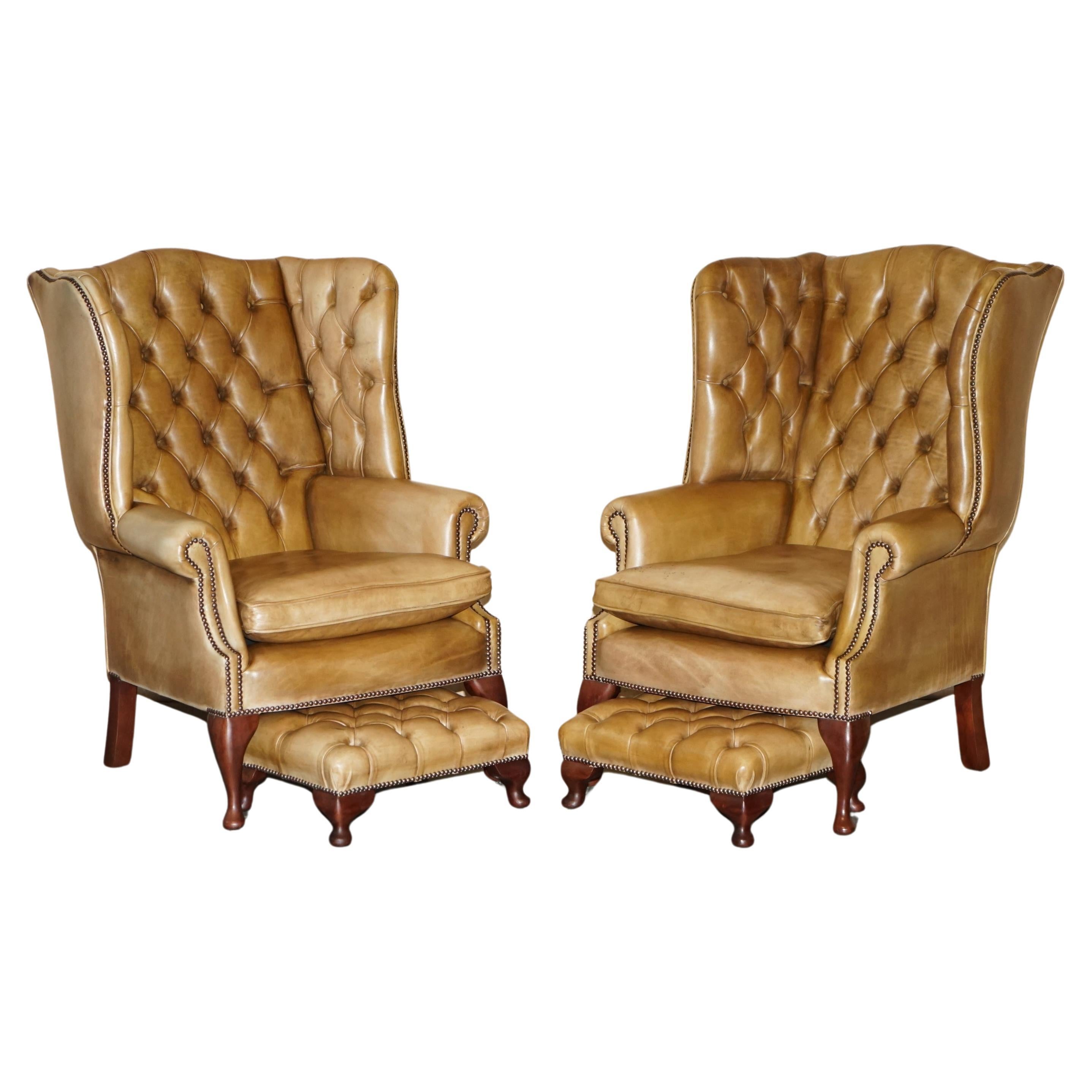PAIR OF VINTAGE TAN BROWN LEATHER CHESTERFiELD WINGBACK CHAIRS WITH FOOTSTOOLS