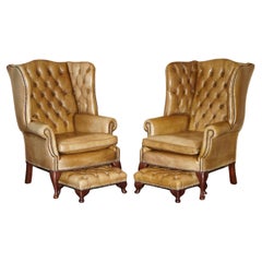 PAIR OF VINTAGE Tan BROWN LEATHER CHESTERFiELD WINGBACK CHAIRS WITH FOOTSTOOLS