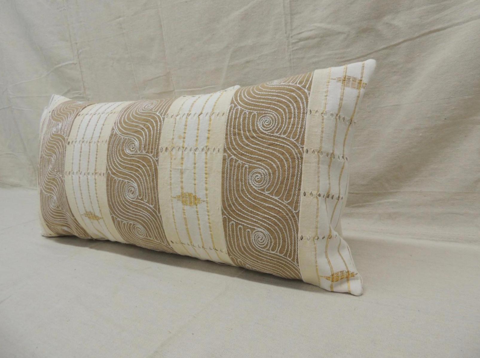 Pair of vintage decorative bolster pillows. The textile is a handwoven tan and brown ewe stripweave with white embroidery from late 20th century Ghana. 
Decorative pillows were handcrafted and designed in the USA.
Closure by stitch (no zipper