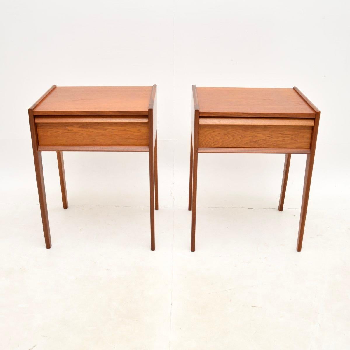 A stylish and extremely well made pair of vintage teak bedside tables by Younger. They were designed by John Herbert, they were made in England and date from the 1960’s.

The quality is superb, they are beautifully styled and are a very useful size.