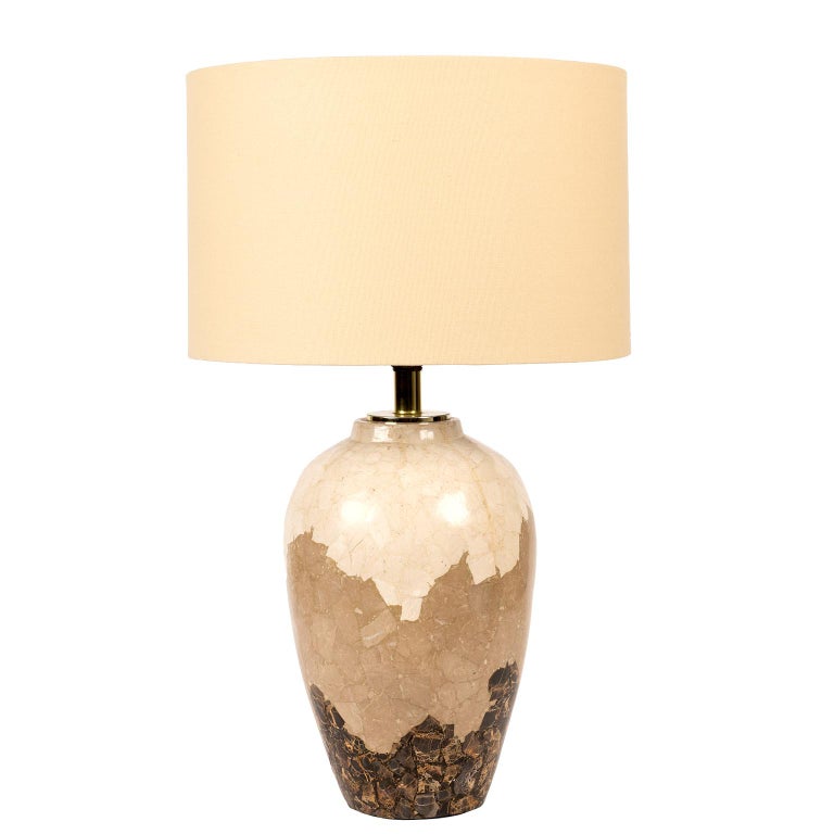 Theses unique and fabulous vintage lamps combine three different shades of terrazzo marble. Brown, beige and off white.
The overall height is 27” to the top of the complimentary vintage soft beige lamp shades.