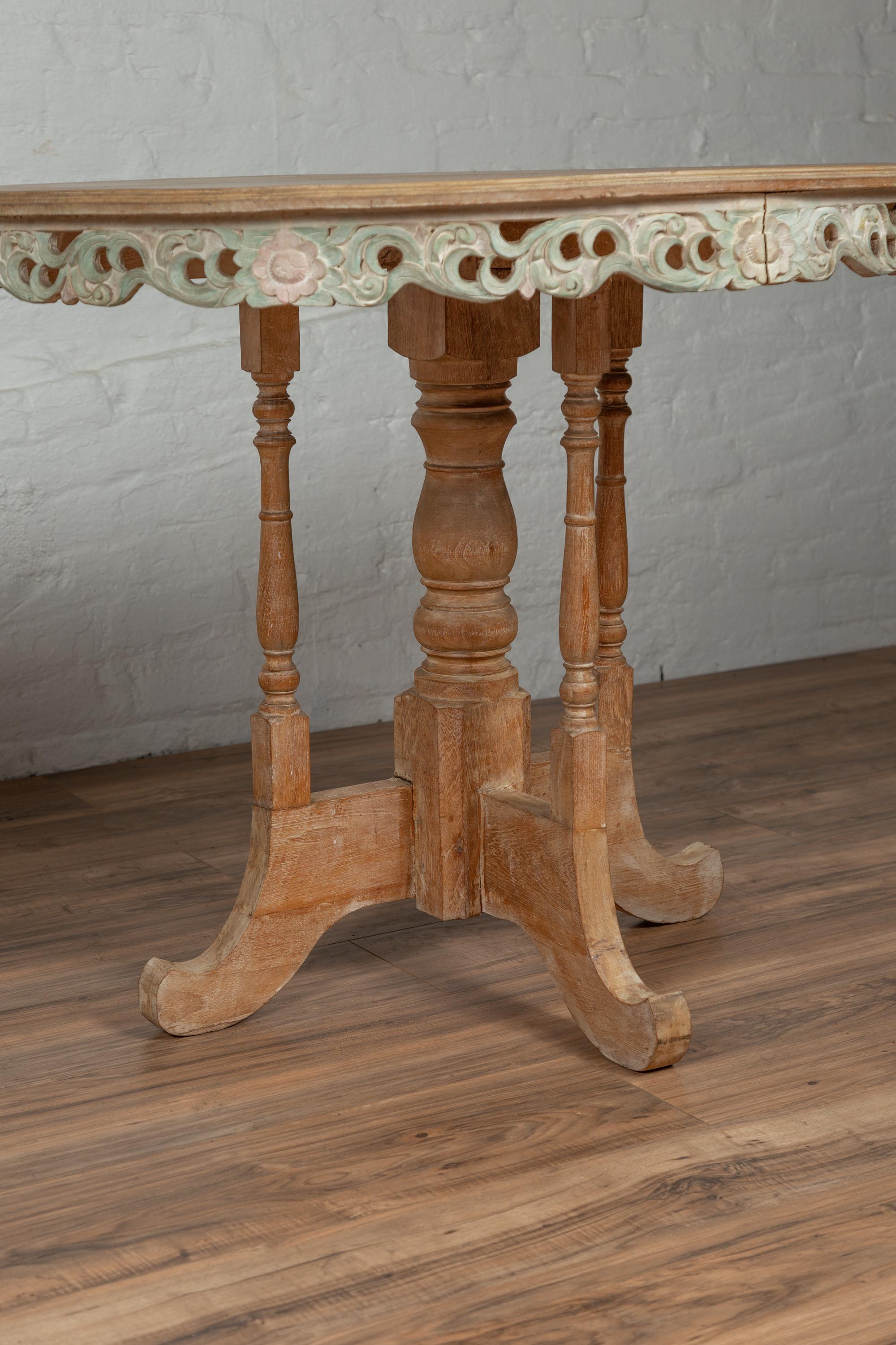Pair of Vintage Thai Teak Demilune Tables with Hand Carved Apron and Turned Base In Good Condition In Yonkers, NY