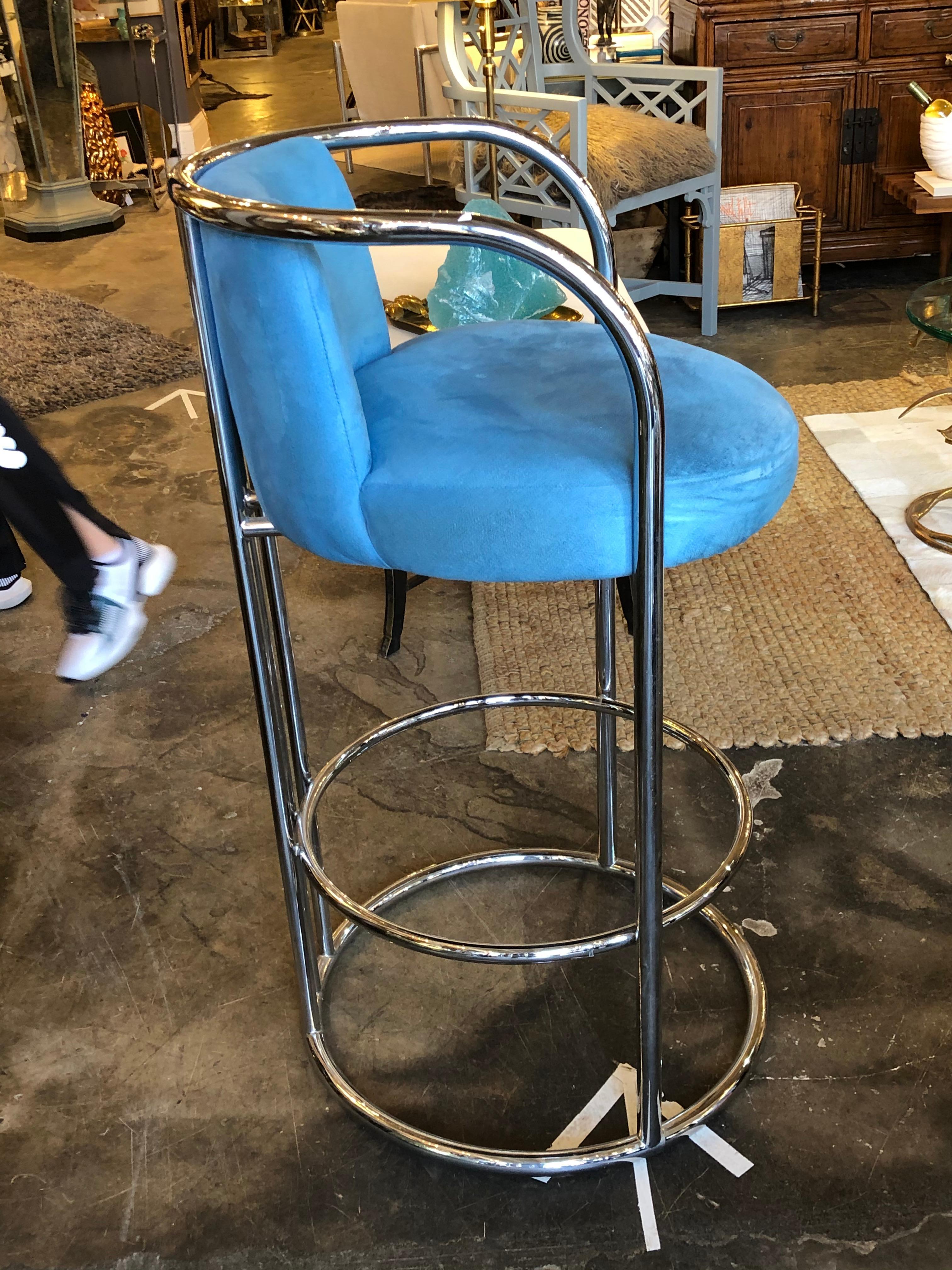 A pair of vintage Thayer Coggin tubular chrome bar stools having blue velvet upholstery. Original label.