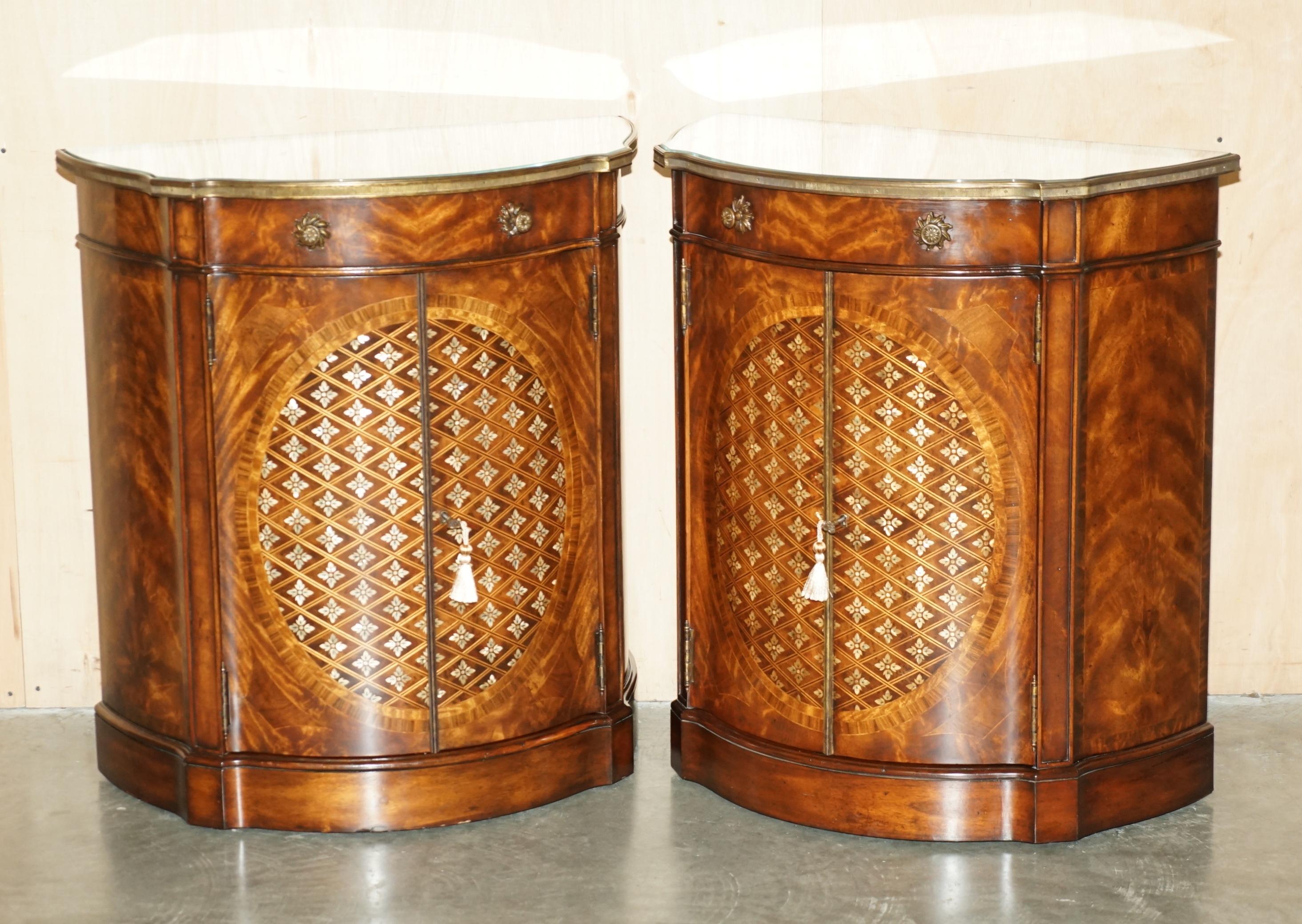 Royal House Antiques

Royal House Antiques is delighted to offer for sale this exquisite pair of hand made Theodore Alexander Demi Lune sideboards with Mother of Pearl inlay to the top and front 

Please note the delivery fee listed is just a guide,