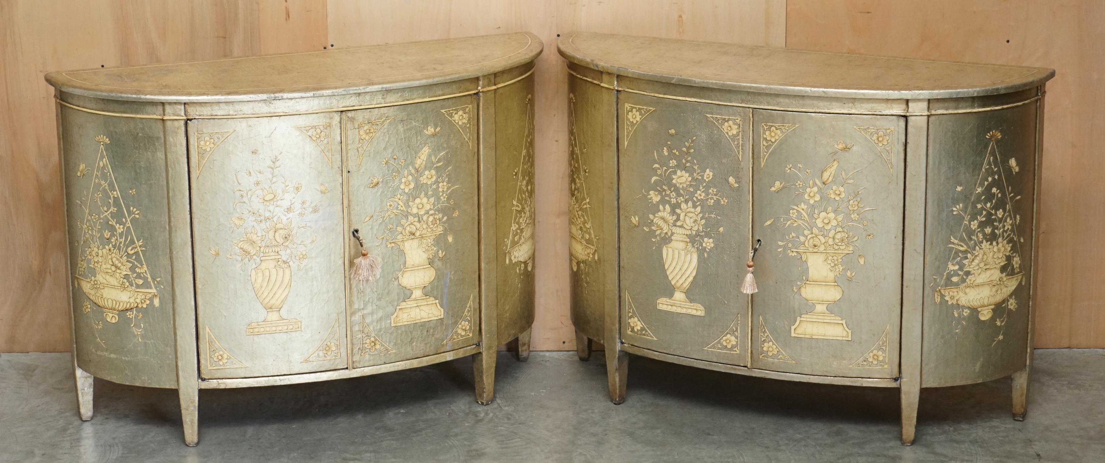 Royal House Antiques

Royal House Antiques is delighted to offer for sale this exquisite pair of hand made Theodore Alexander Demi Lune sideboards with silver leaf Adams Sheraton Revival style paintings 

Please note the delivery fee listed is just