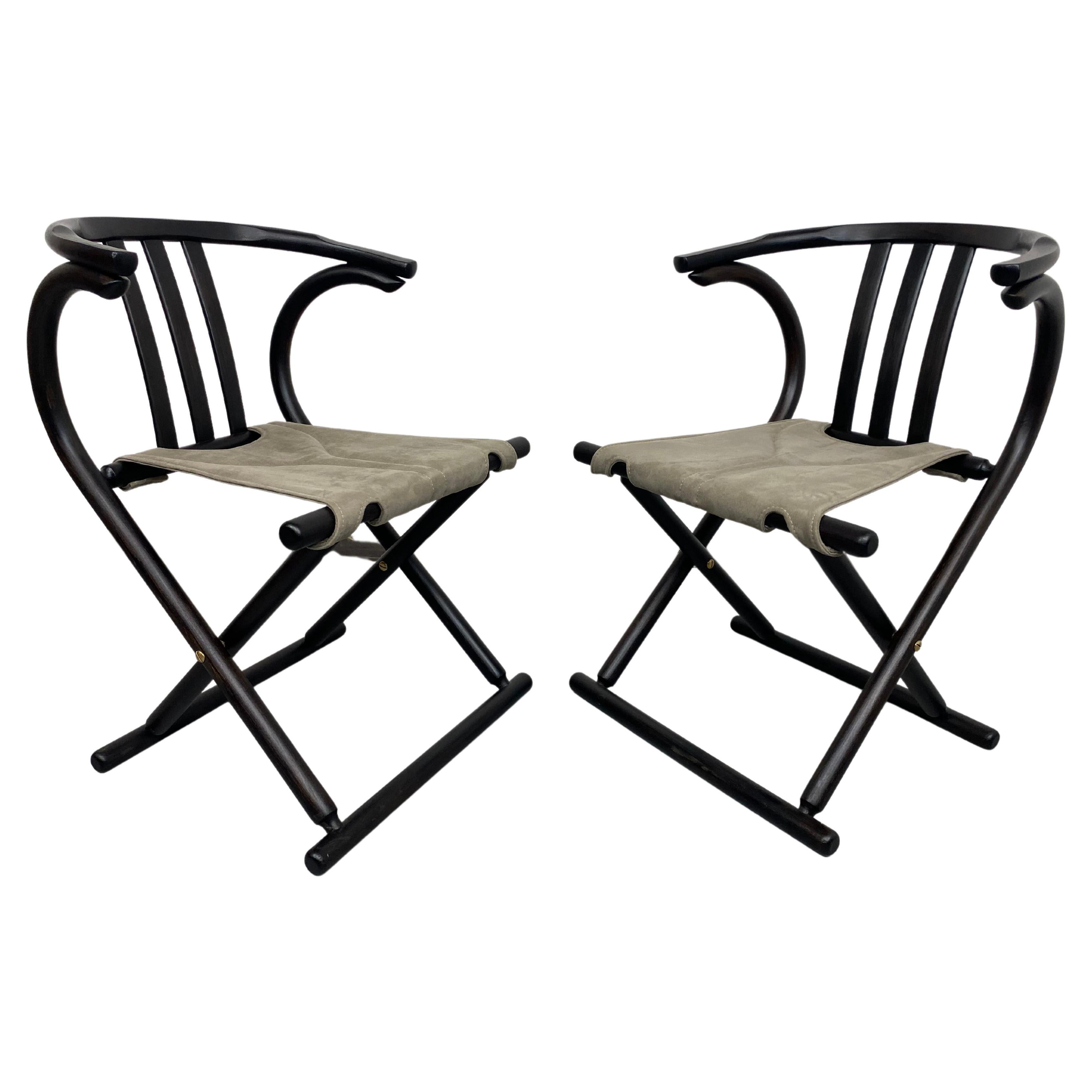 Pair of vintage Thonet folding chairs professionally stained and repolished, new fabric.