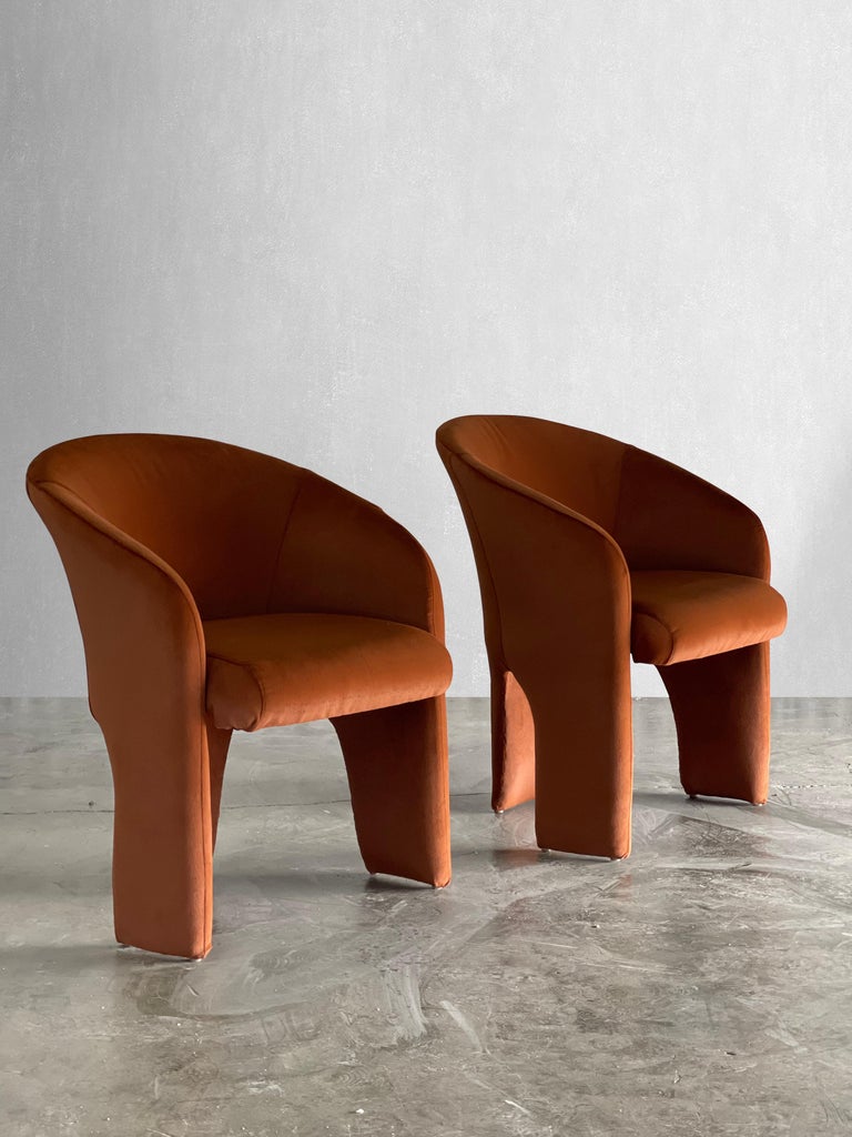 C. 1980

Striking sculptural three-legged chairs. These chairs have been recovered in a plush rust colored velvet. They sit extremely comfortable. The fabric is gorgeous to the touch.

Dimensions:

25W x 32H x 27D

Seat height 18.5 

Seat