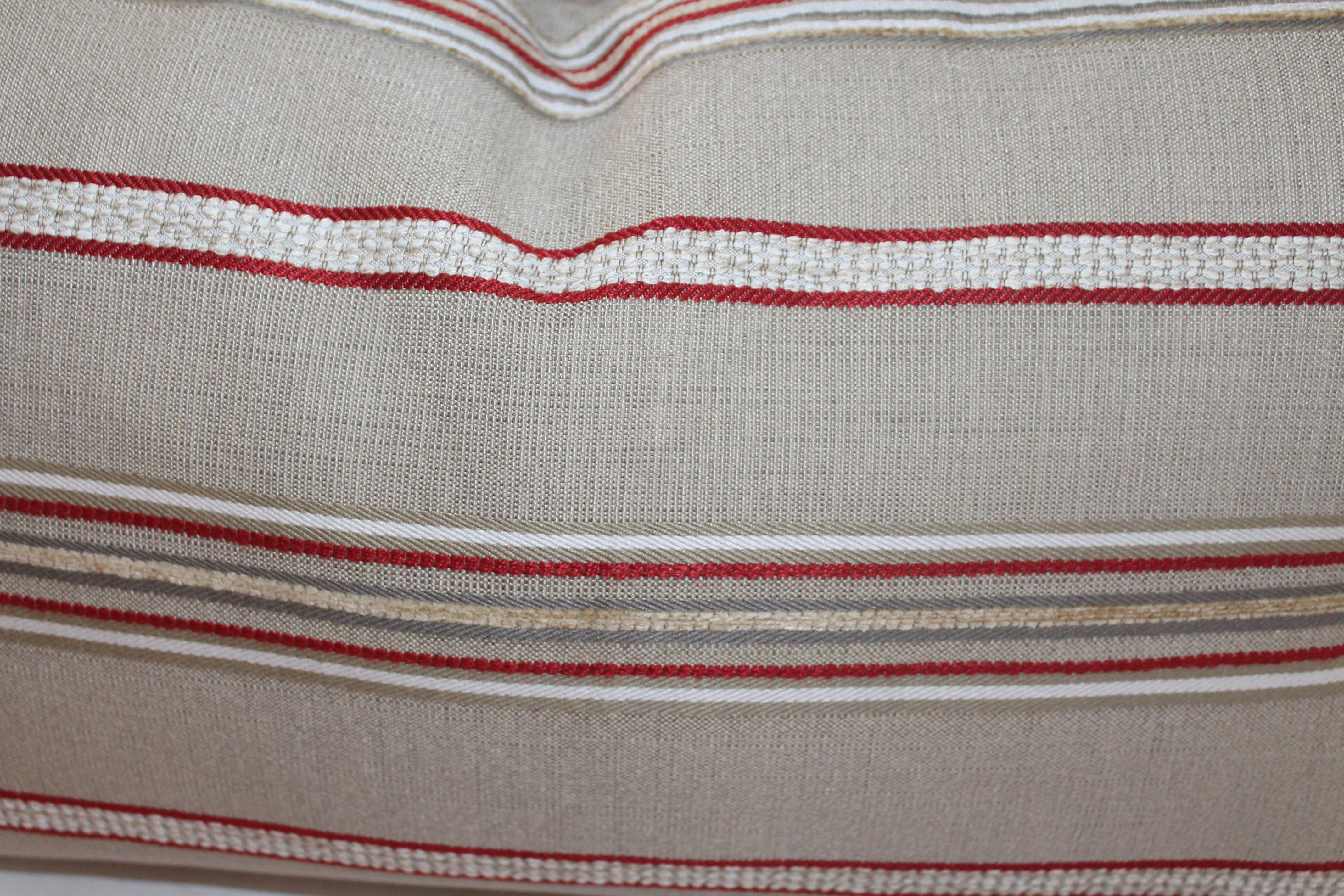 Vintage red and tan ticking bolster pillows. Sold as a pair only. Condition is very good.