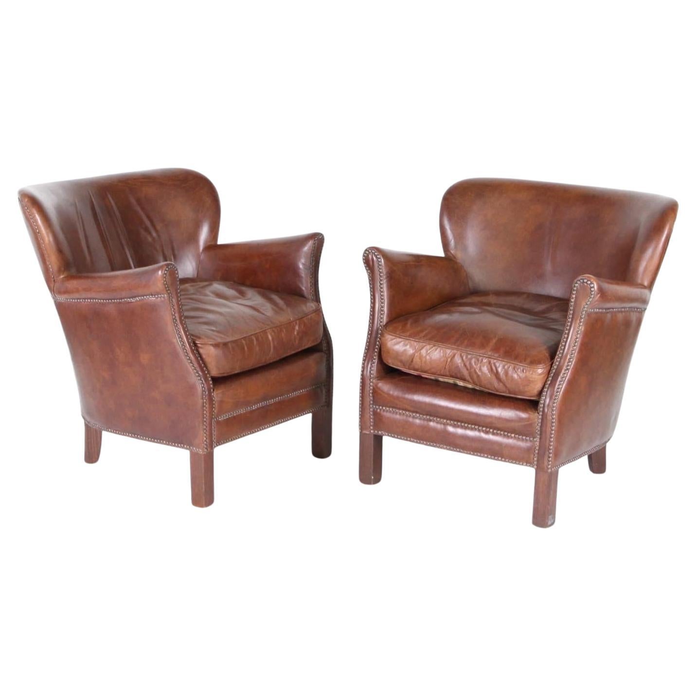 Pair of Distressed Leather Club Chairs at 1stDibs