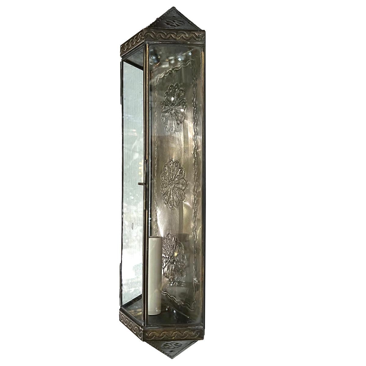 Pair of Italian circa 1960's tole sconces with foliage motif.

Measurements:
Height: 20
