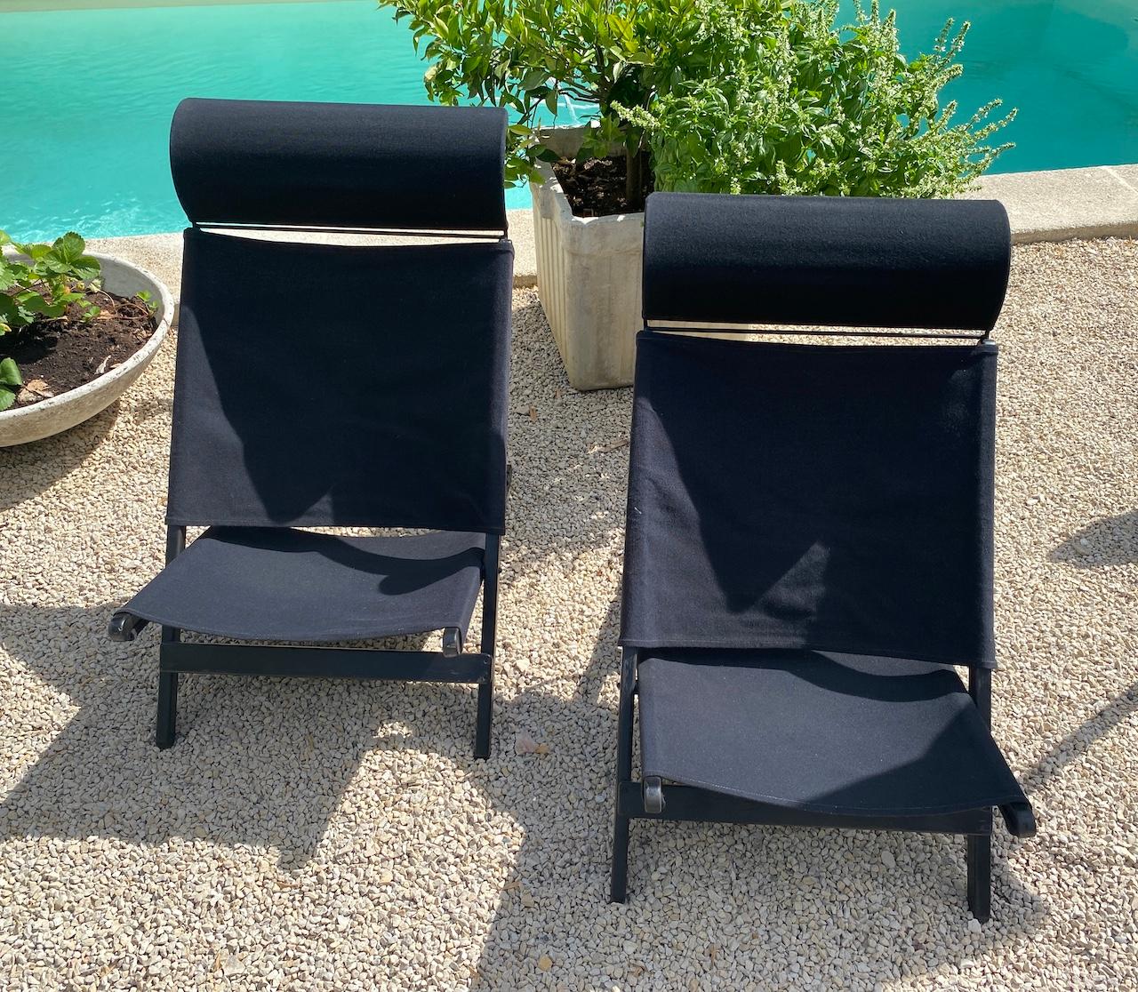 Pair of Vintage Tord Bjorklund Ikea 1990 lounge armchairs in steel and wood, foldable.

Black canvas seats and backs.
Good condition.