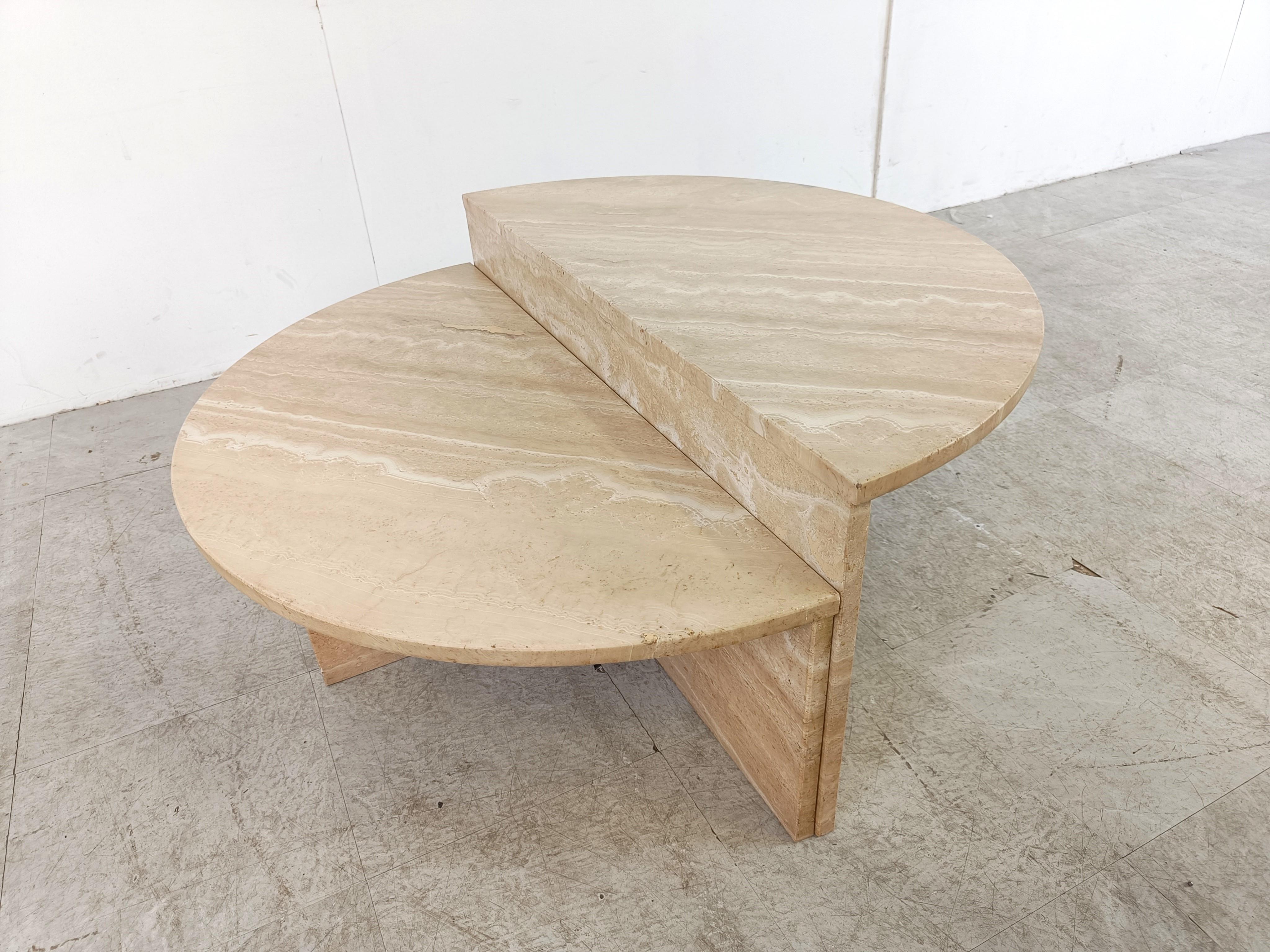 Timeless travertine coffee tables with half round table tops. When put together they form a circle with two levels.

Gorgeous natural vaining in the travertine stone.

Good condition

1970s - Italy

Height tallest table: 40cm/15.74