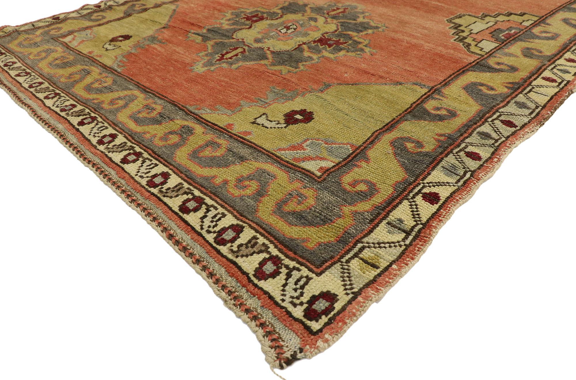 51794-51795, pair of vintage Turkish Oushak runners, matching hallway runners. This pair of matching vintage Turkish Oushak runners each feature columns of four lobed floral medallions spread across abrashed terracotta fields. Stepped geometric