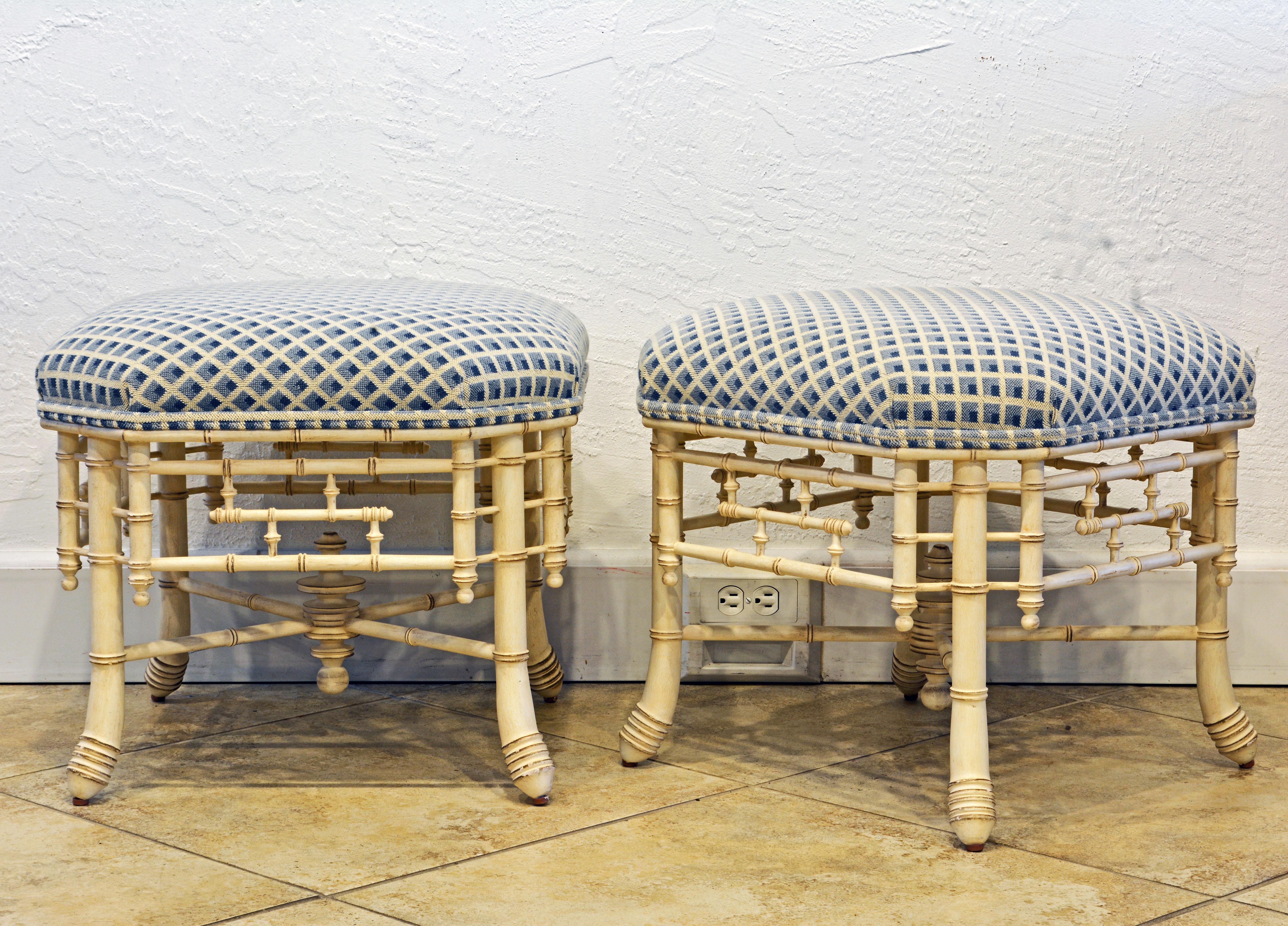 This charming pair of ivory white painted faux bamboo upholstered benches or ottomans feature tasteful cover fabric with a summer feel and an intricate supporting structure in the Aesthetic Movement style.