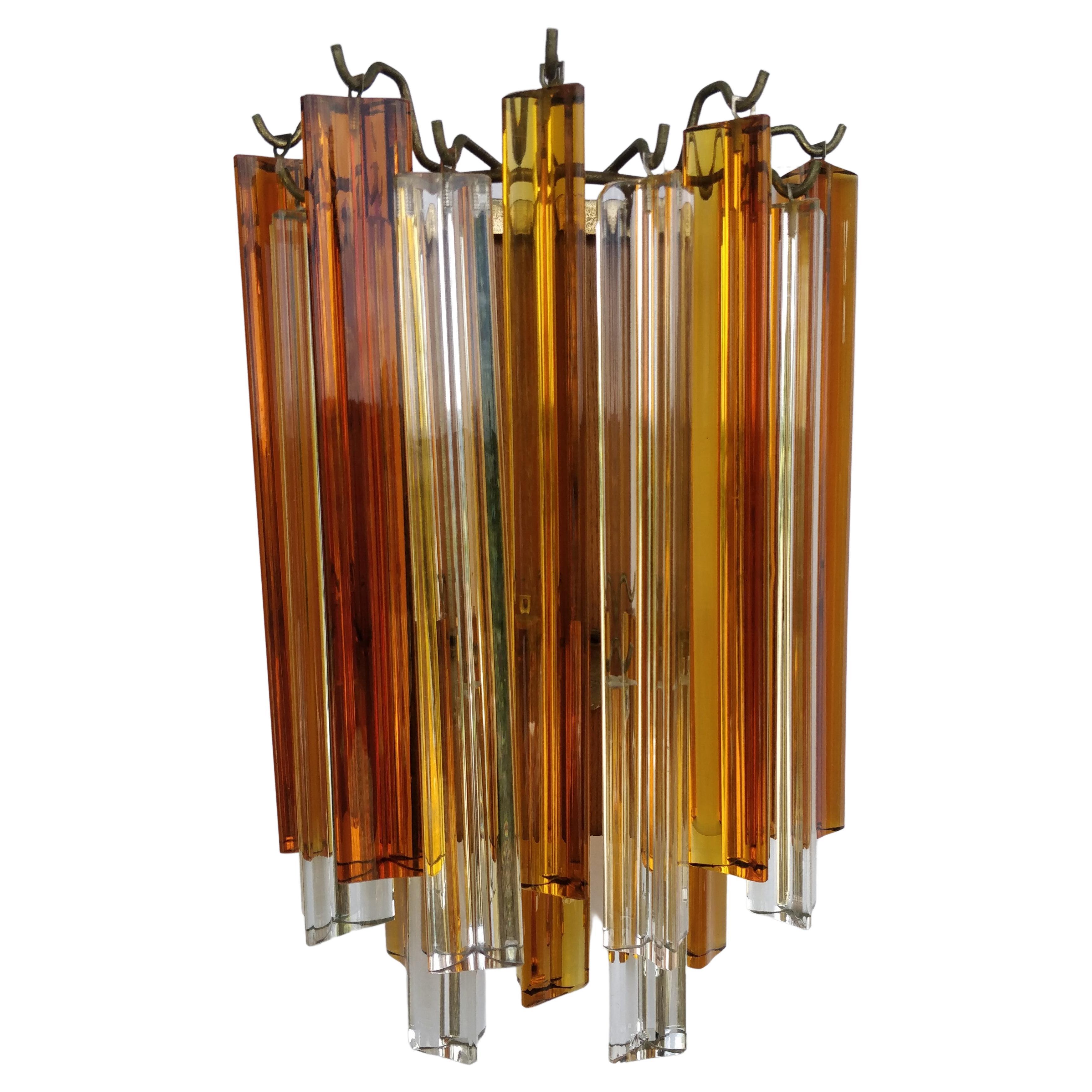Pair of vintage Venini wall sconces Murano glass 1970s orange and white.
Made by 14 prism triedri.
The total dimension is  H 37 x 24 cm
Perfect condition and fully workig; normal and slight signs of wear on the structure, glass in perfect