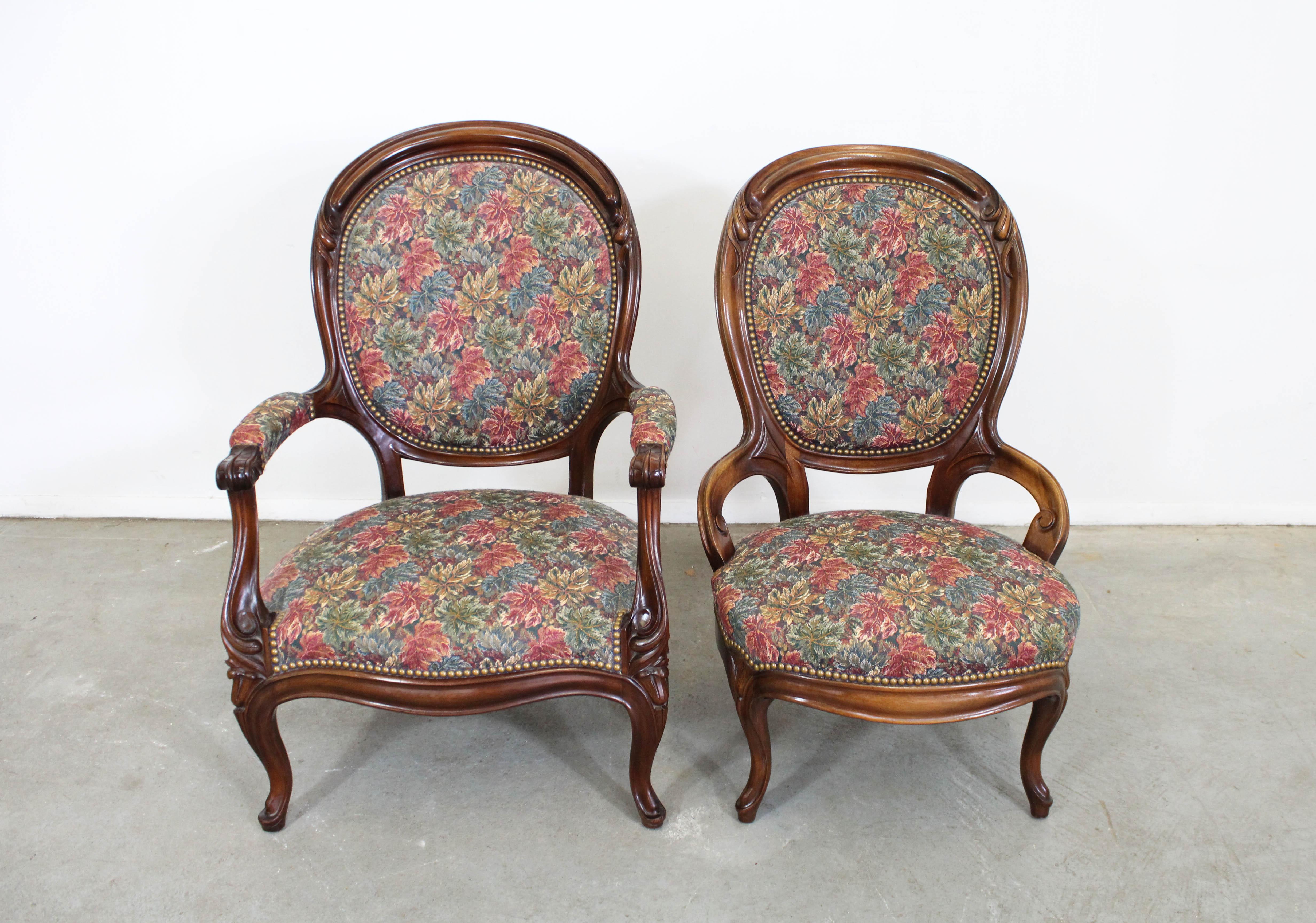Pair of vintage Victorian parlor set ladies and gentleman chairs.

Offered is a pair of vintage Victorian parlor chairs with carved legs and arms and floral upholstery. Includes a Gentlman's and Lady's chair. They are in good condition with usable