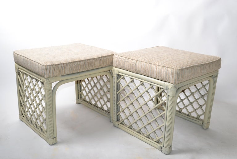 A pair of vintage olive green bamboo and rattan stools or benches made by Vogue Rattan.
Original stripped Linen Fabric.
Makers Mark underneath, Vogue Rattan.