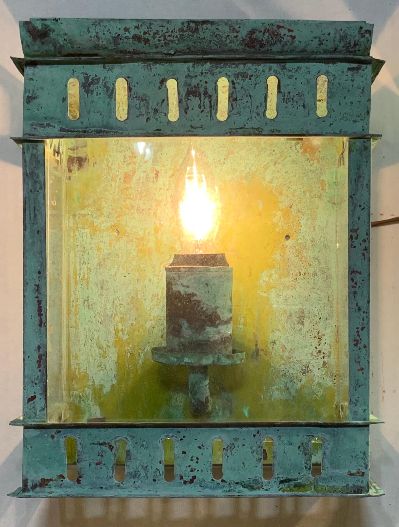 Artsy pair of wall lantern hand forged from solid copper with one 60/watt light each, suitable for wet location, beautiful oxidized patina. This pair were hand fabricated by the artist and slightly
Deferent is the socket one with cap the other