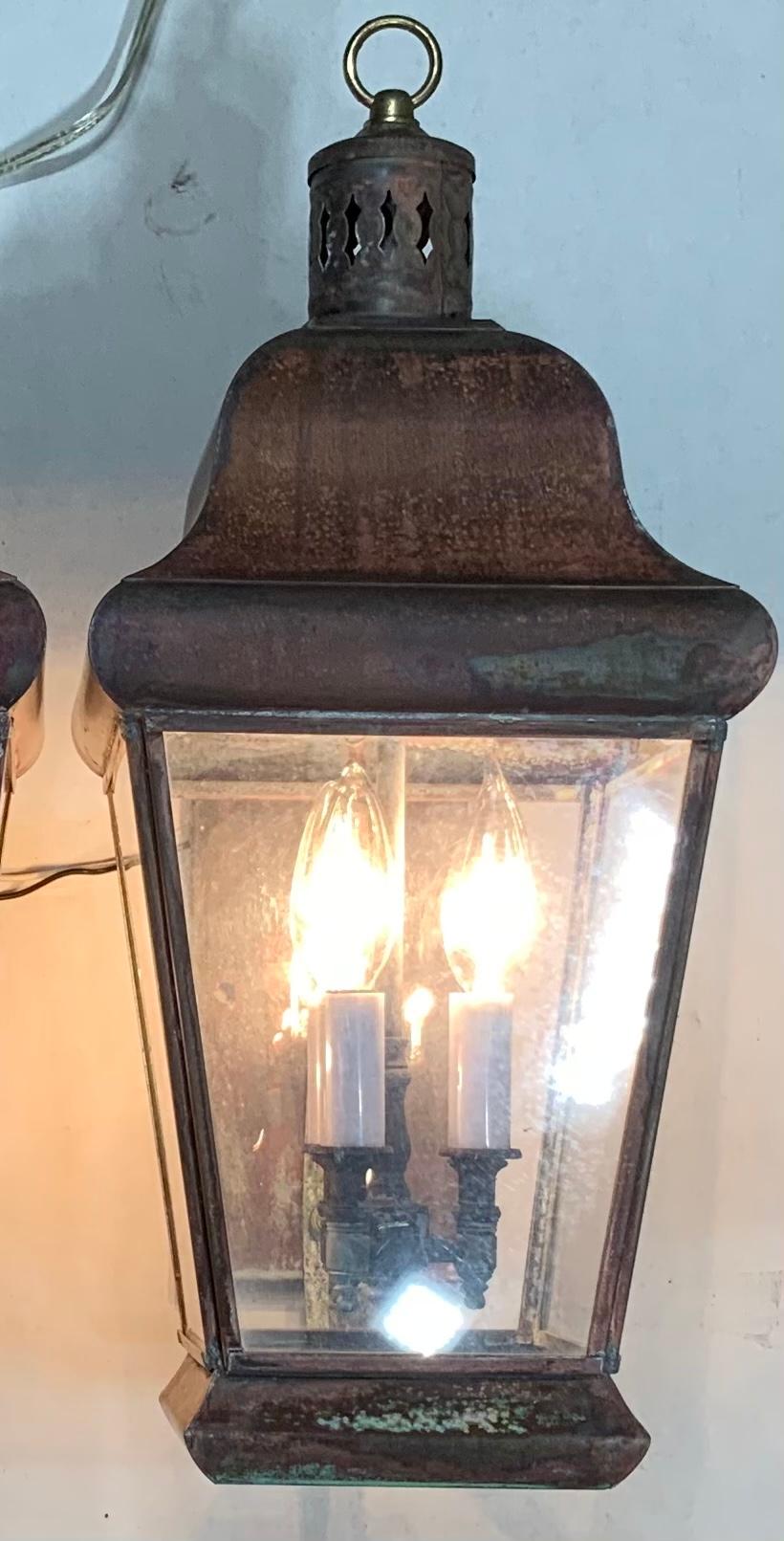 Elegant pair of wall lantern made of solid brass, with three 40 /watt light each. Original Plexiglass sides instead
Glass. Suitable for wet location.
In one lantern the cluster lights are higher than the other lantern, although will not make much