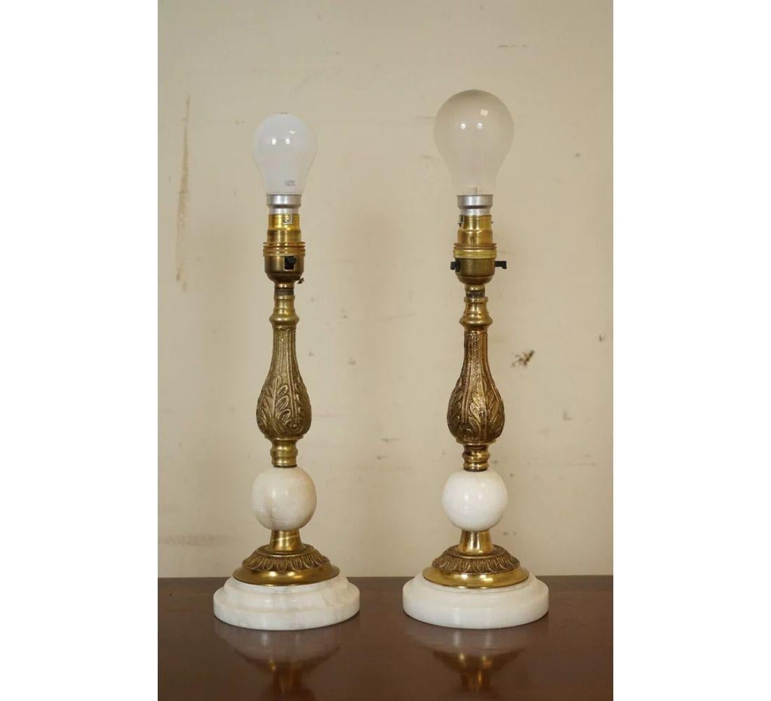 We are delighted to offer for sale this beautiful vintage brass lamps with a decorative marble ball and base.

We have lightly restored this by cleaning and polishing it, this has all been done carefully by hand.

The lightbulbs are not
