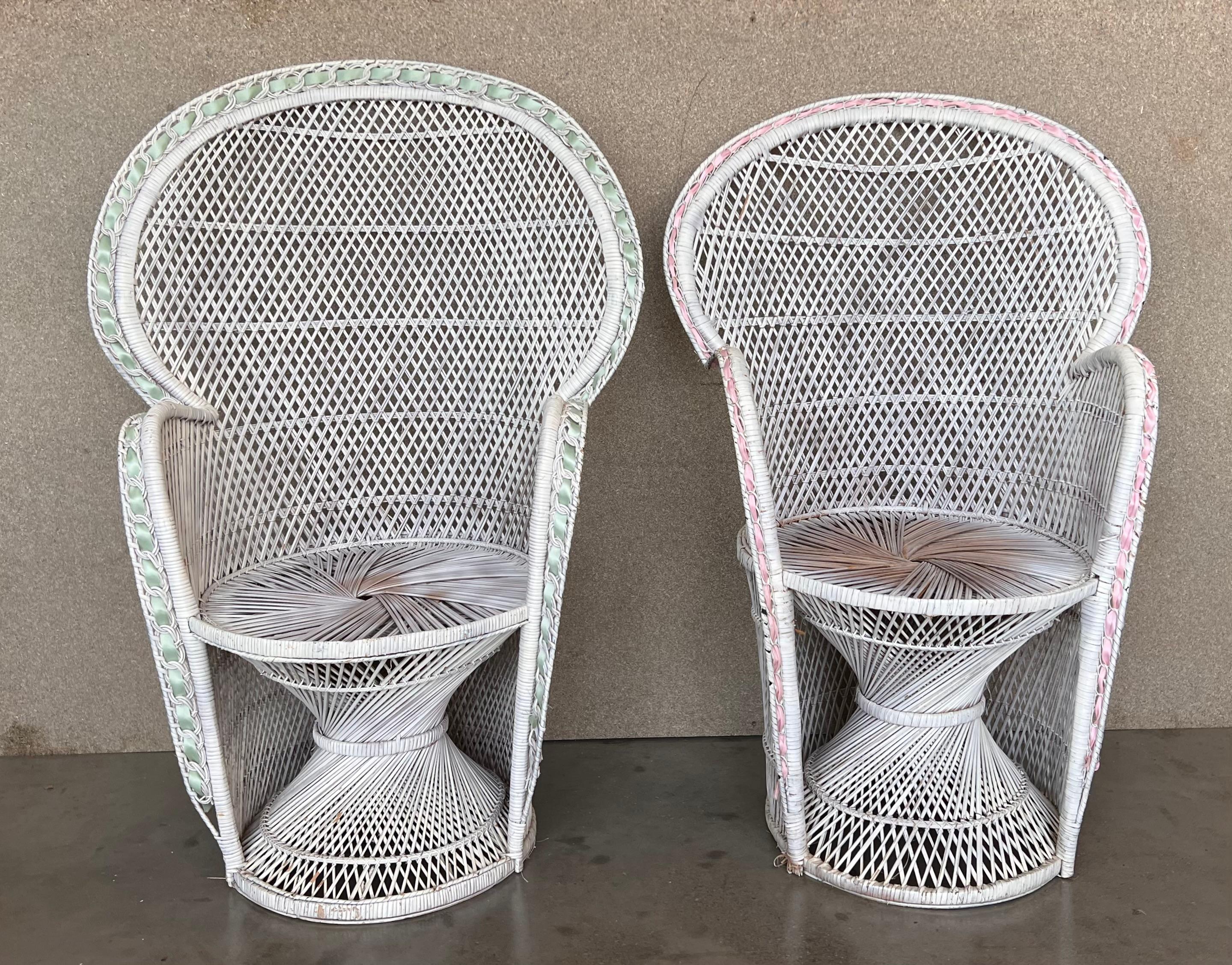 Vintage wicker peacock chair features a fine cross-weave pattern and intricate black rattan detailing. Twisted design base and large fan back. Very good condition with minor imperfections consistent with age. May exhibit scuffs, marks, or wear, see