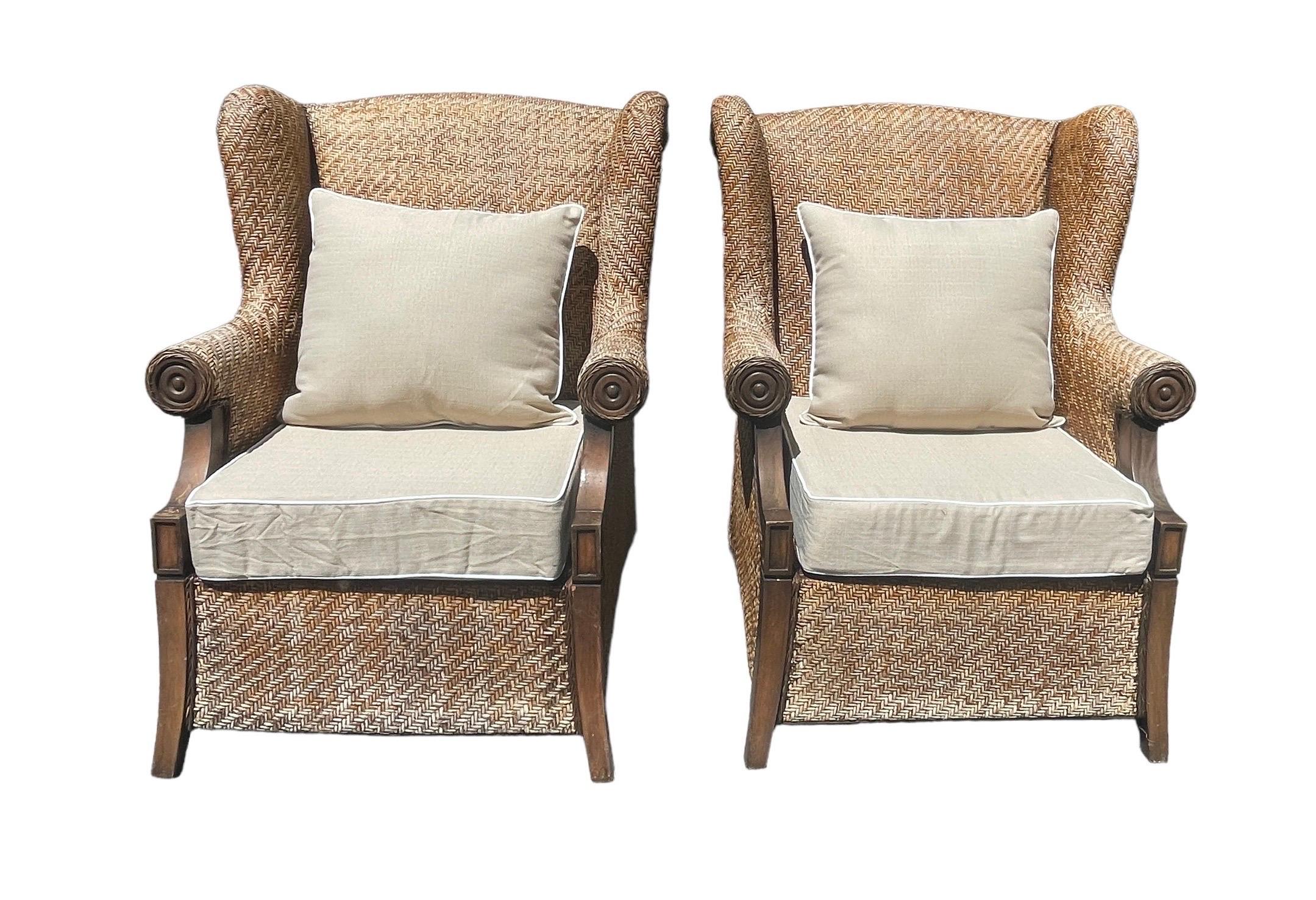 Woven wicker rattan lounge chairs. Iconic weathered regal wingback armchair set. 

Gorgeous vintage condition and super large and comfortable. Wood trim and frames so these are extremely heavy.

Can be left with bleached woven rattan or conditioned