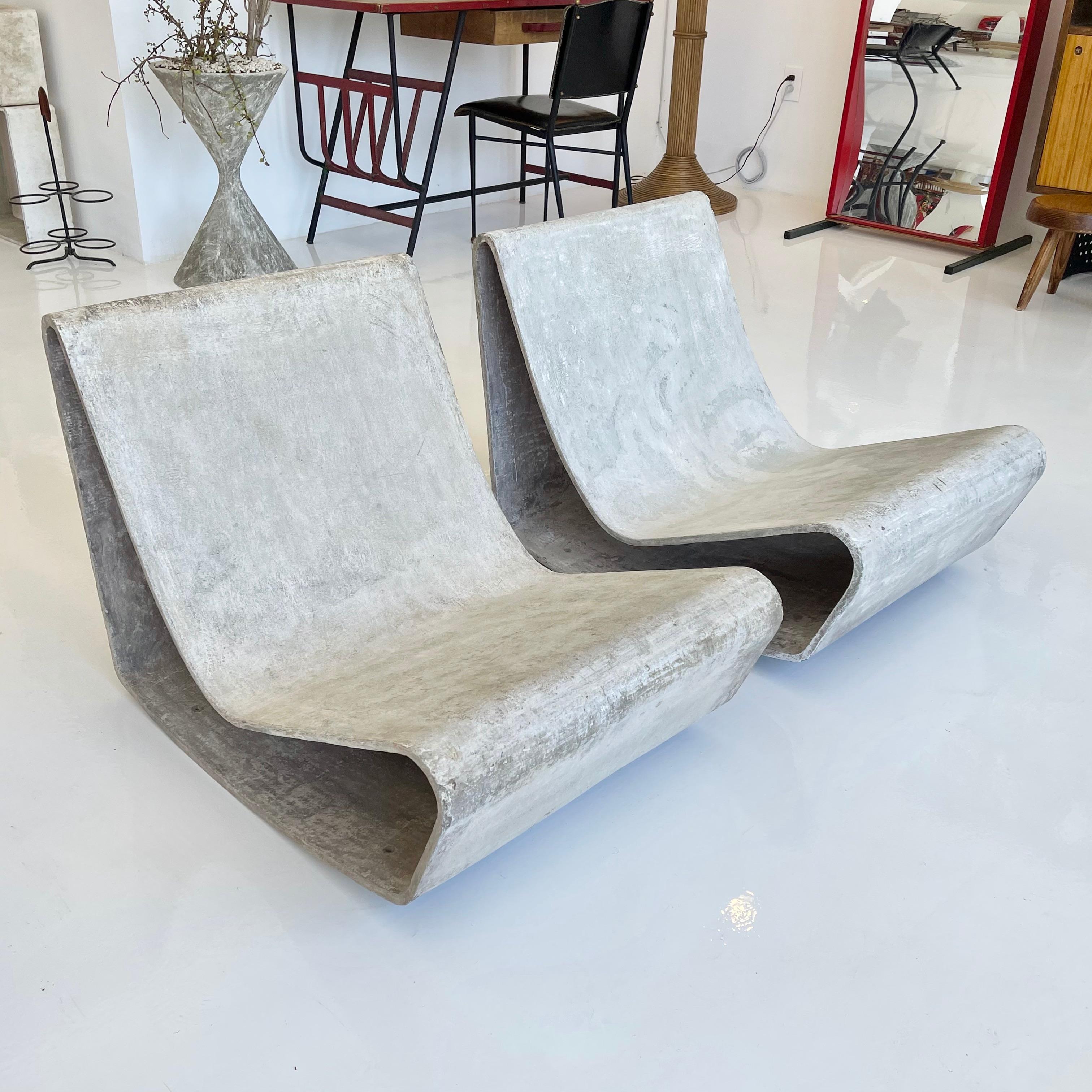 Fantastic set of vintage concrete loop chairs by Swiss designer Willy Guhl for Eternit. One of the most iconic chairs ever designed. No cracks. Great condition and patina.

Priced as a pair. 

4 pairs available. 





