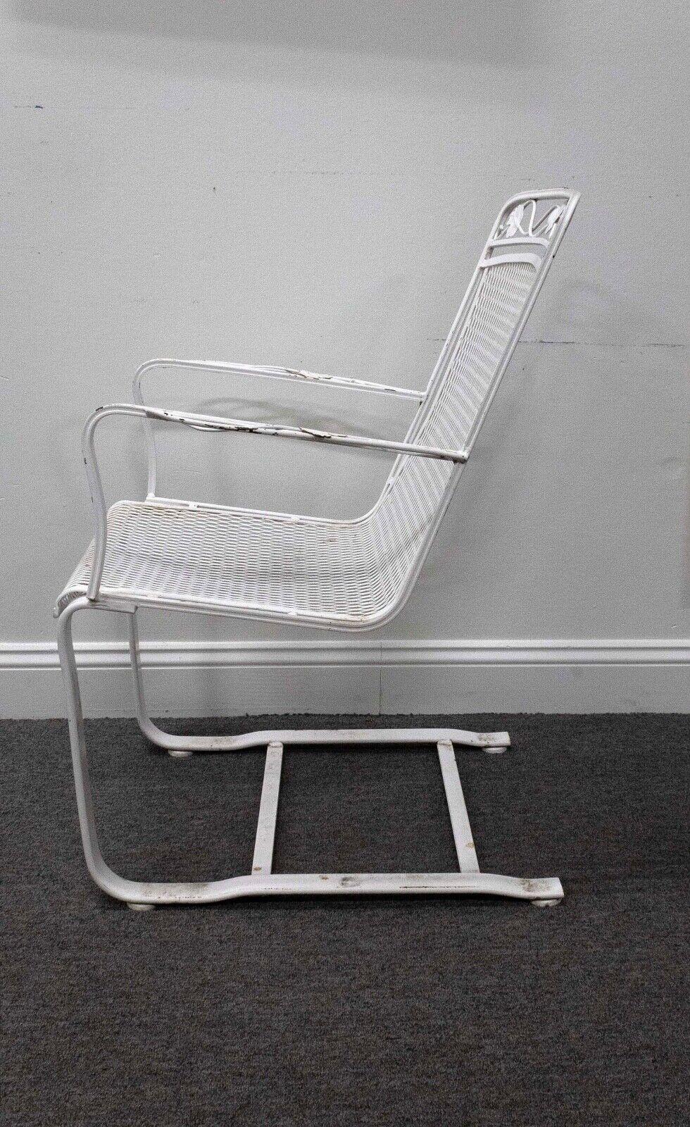 Pair of Vintage Woodard Wrought Iron Flex Rocking Chairs Mid Century Modern In Good Condition For Sale In Keego Harbor, MI