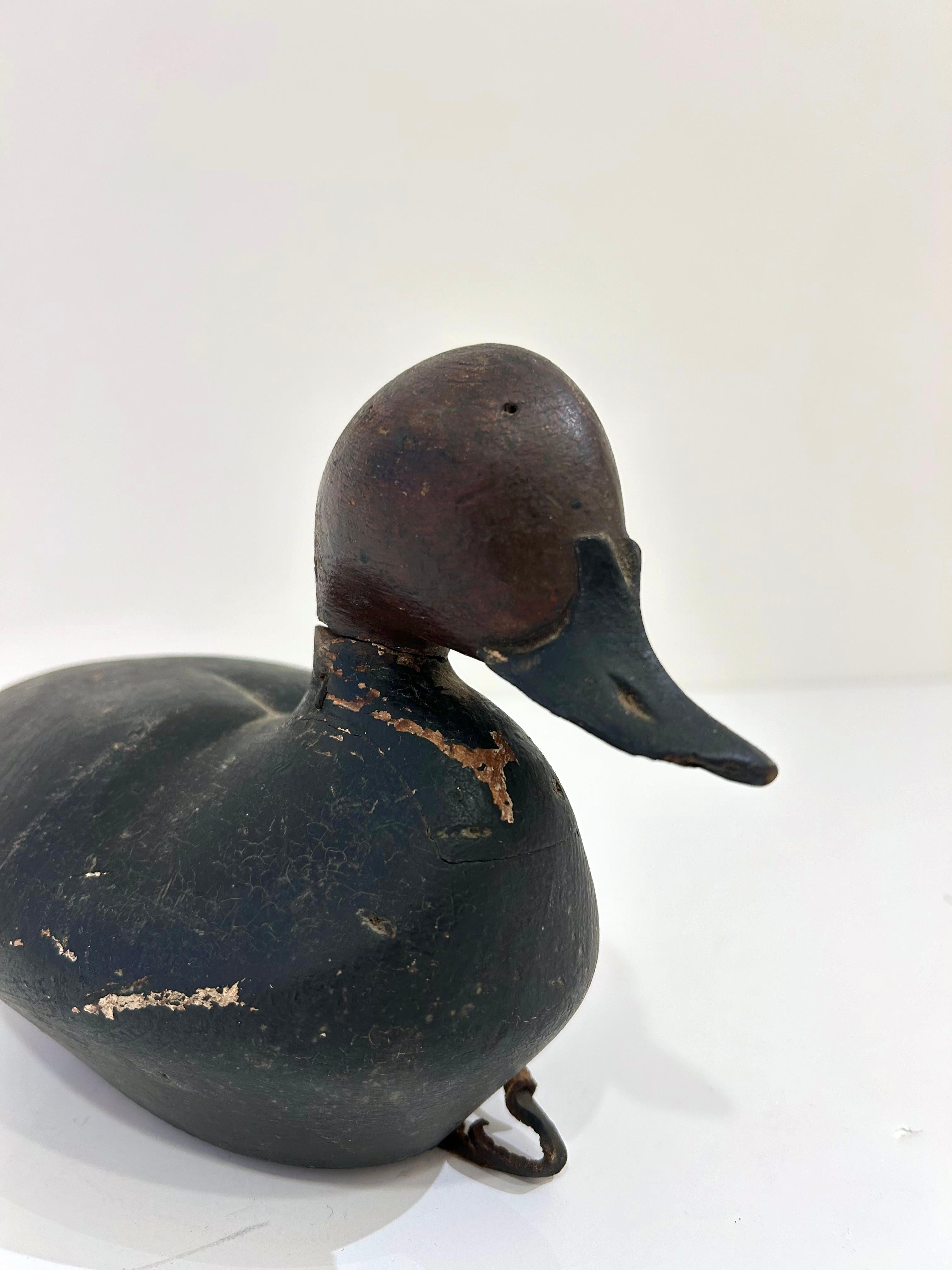 Pair of Vintage Wooden Duck Decoys In Fair Condition For Sale In New York, NY