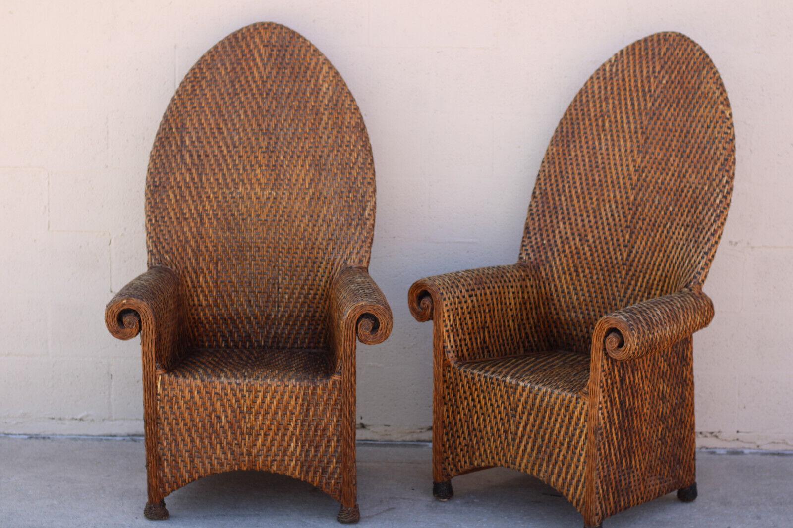 Hand-Crafted Pair of Vintage Woven Rattan High Back Roll-Arm Chairs For Sale