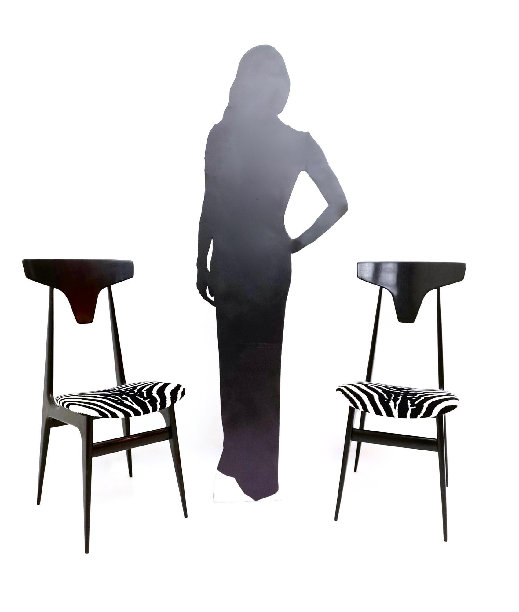 Made in Italy, 1950s. 
These chairs feature an ebonized beech frame, which is upholstered in zebra print velvet. 
They might show slight traces of use since they're vintage, but they've been recently reupholstered therefore they can be considered