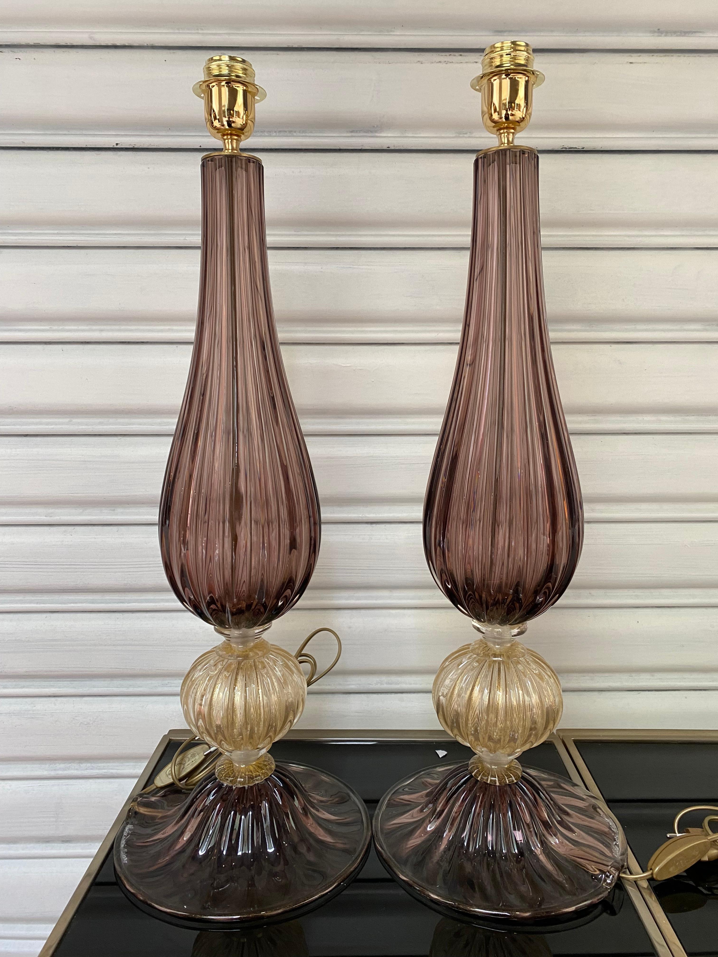 Pair of violet lamps Alberto Dona Murano (11 and 12)
Circa 1970
Signed on the foot 
Dimensions : h68x23cm
Ref : c/1932/22
Price : 3800 € for the pair