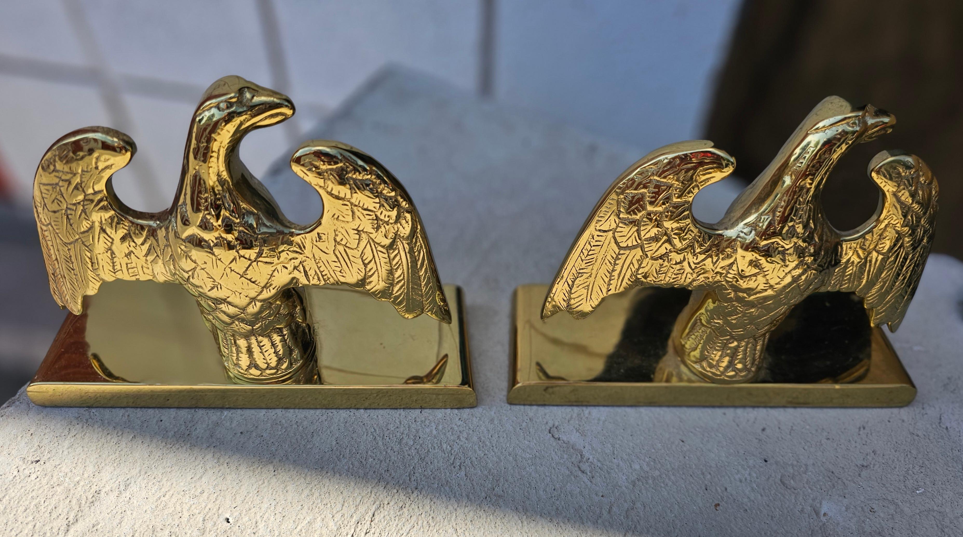 Pair of Mid-Century cast polished brass eagle Bookends by Virginia Metalcrafters.
Measure 7.75