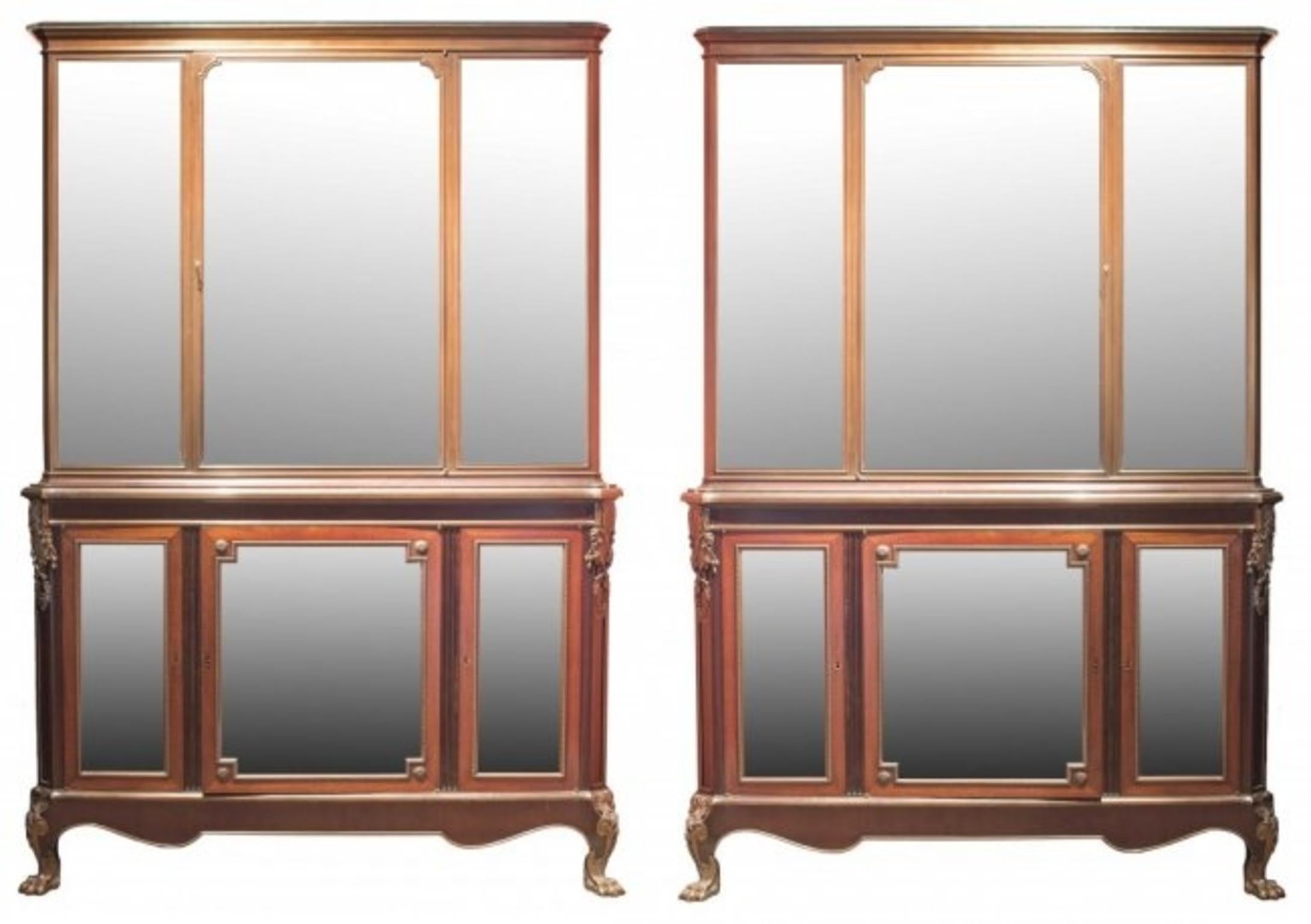 A pair of vitrines, by Henry Dasson, Paris, circa 1889.
Acajou with patinated bronze upper sections, both respectively signed and dated Henry Dasson & Cie, 1889 to the right-hand side molded border, the carcasses stamped HENRY DASSON 1889.