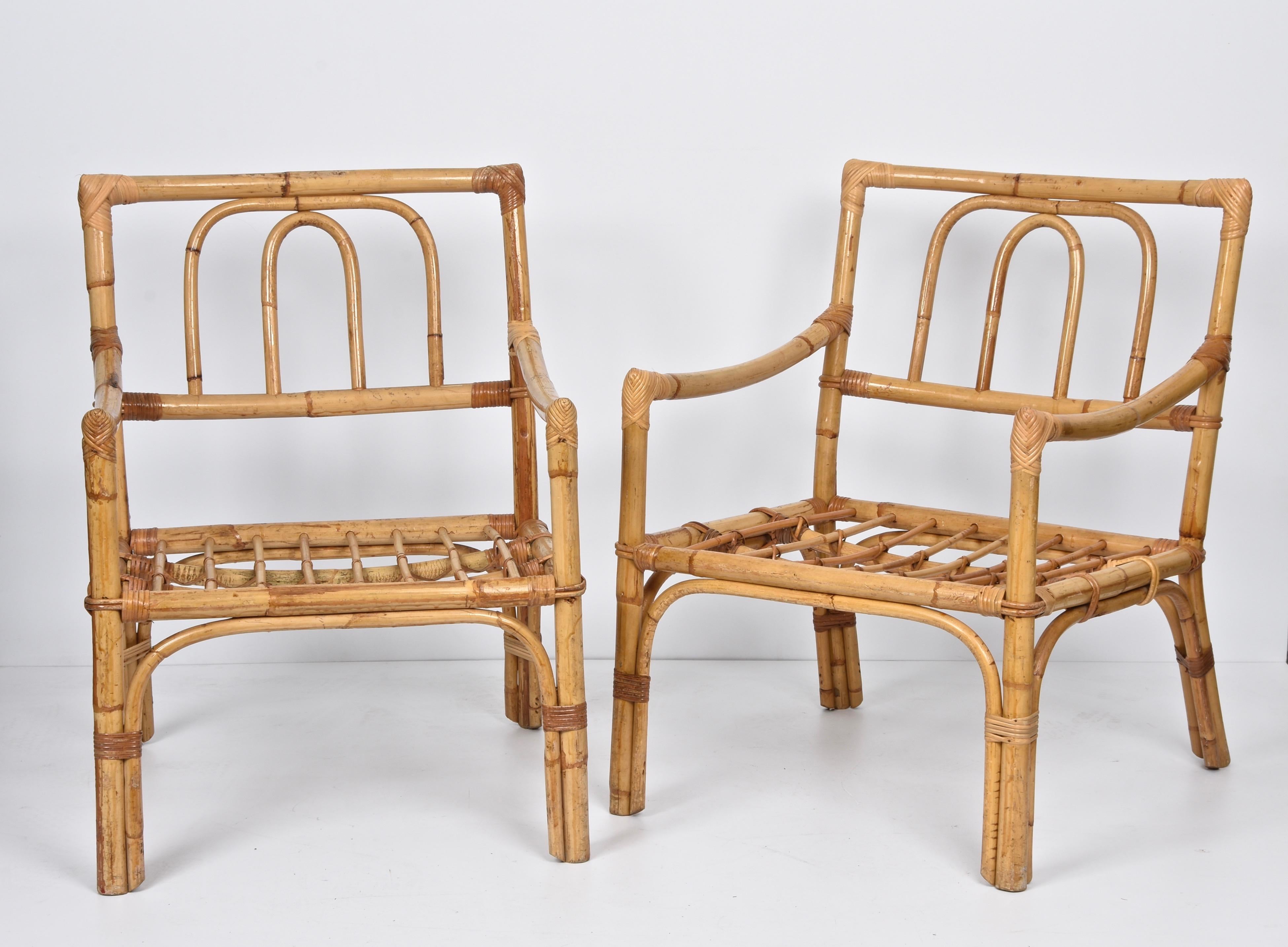 Pair of stunning Mid-Century Modern armchairs in bamboo. This incredible set was designed in Italy during the 1970s following the Vivai del Sud style.

These armchairs thanks to Italian manufacture and handcrafted structure is just amazing.