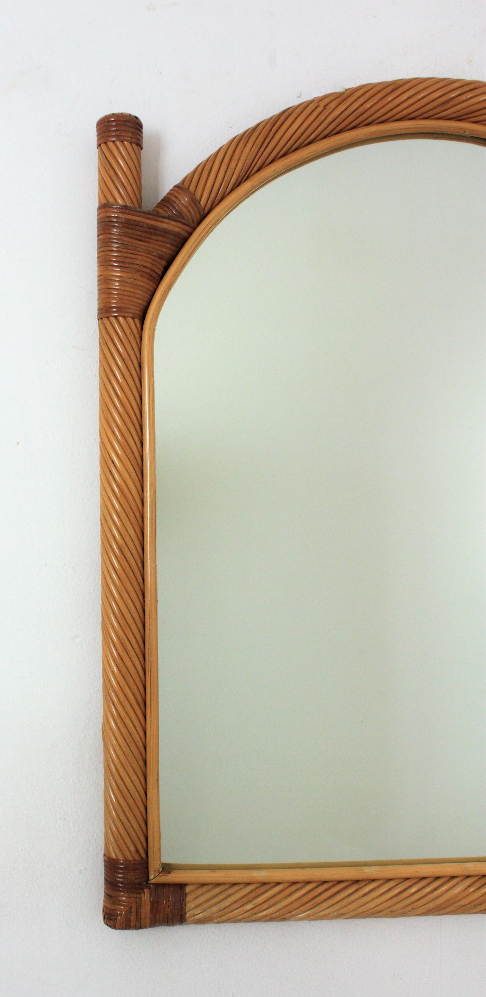 Italian Pair of Vivai del Sud Rattan Pencil Reed Mirrors with Arch Top For Sale